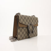 Gold & Beyond Gucci Dionysus Mini Shoulder Bag, stylish handbag with signature design and gold-tone hardware, displayed on a neutral background.