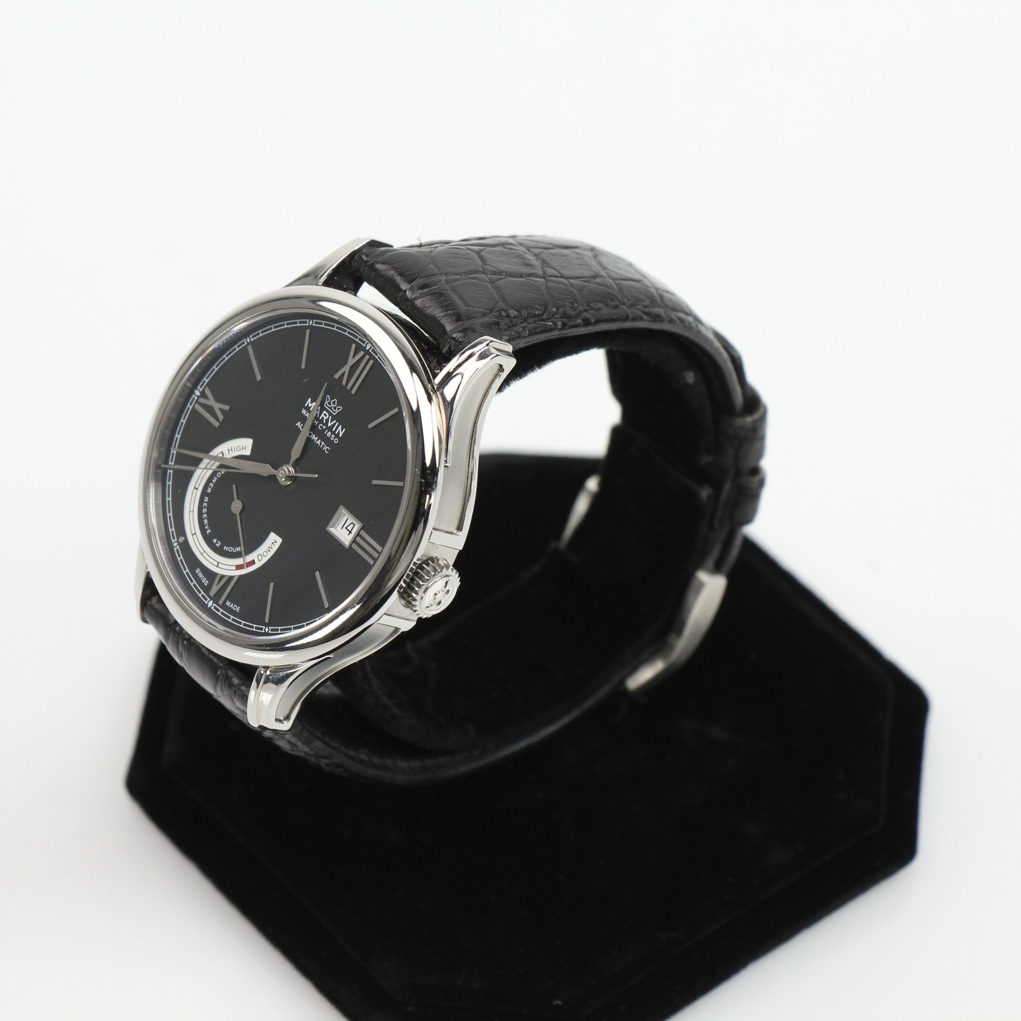 Gold & Beyond Marvin automatic dress watch with sleek black dial and stainless steel band, stylish and elegant accessory.