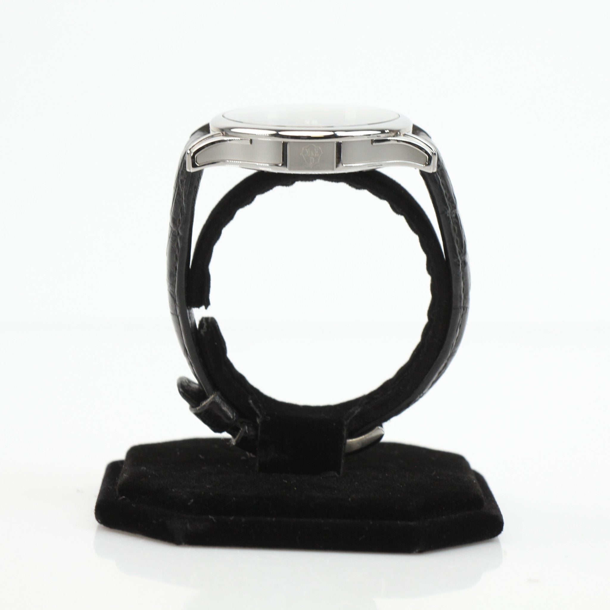 Marvin automatic dress watch by Gold & Beyond showing a sleek round face, silver dial, and stainless steel strap.