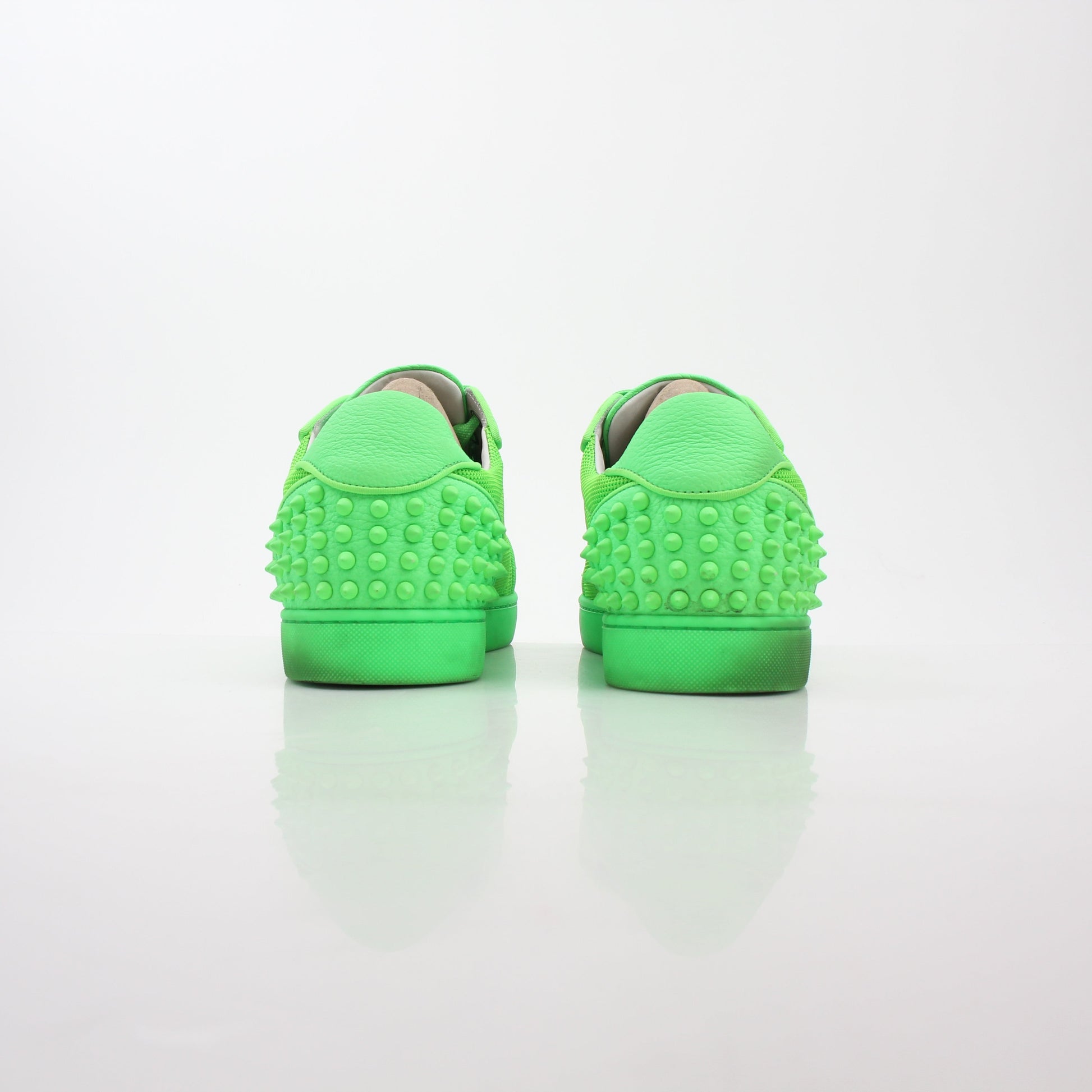Christian Louboutin Green Seavaste 2 Orlato sneakers, stylish shoes with vibrant green color and signature detailing.