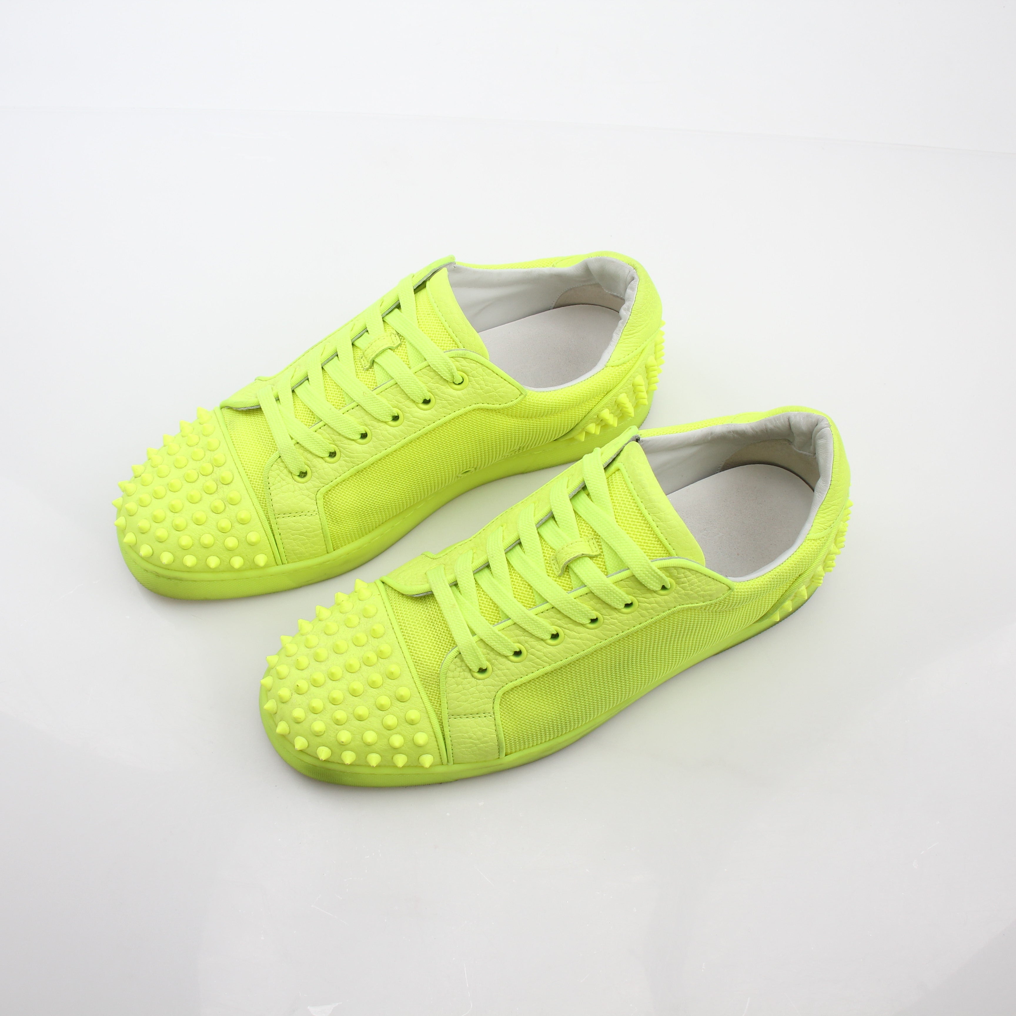 Christian Louboutin Neon Yellow Seavaste 2 Orlato sneakers with bold yellow color and stylish design, shown from the side view.