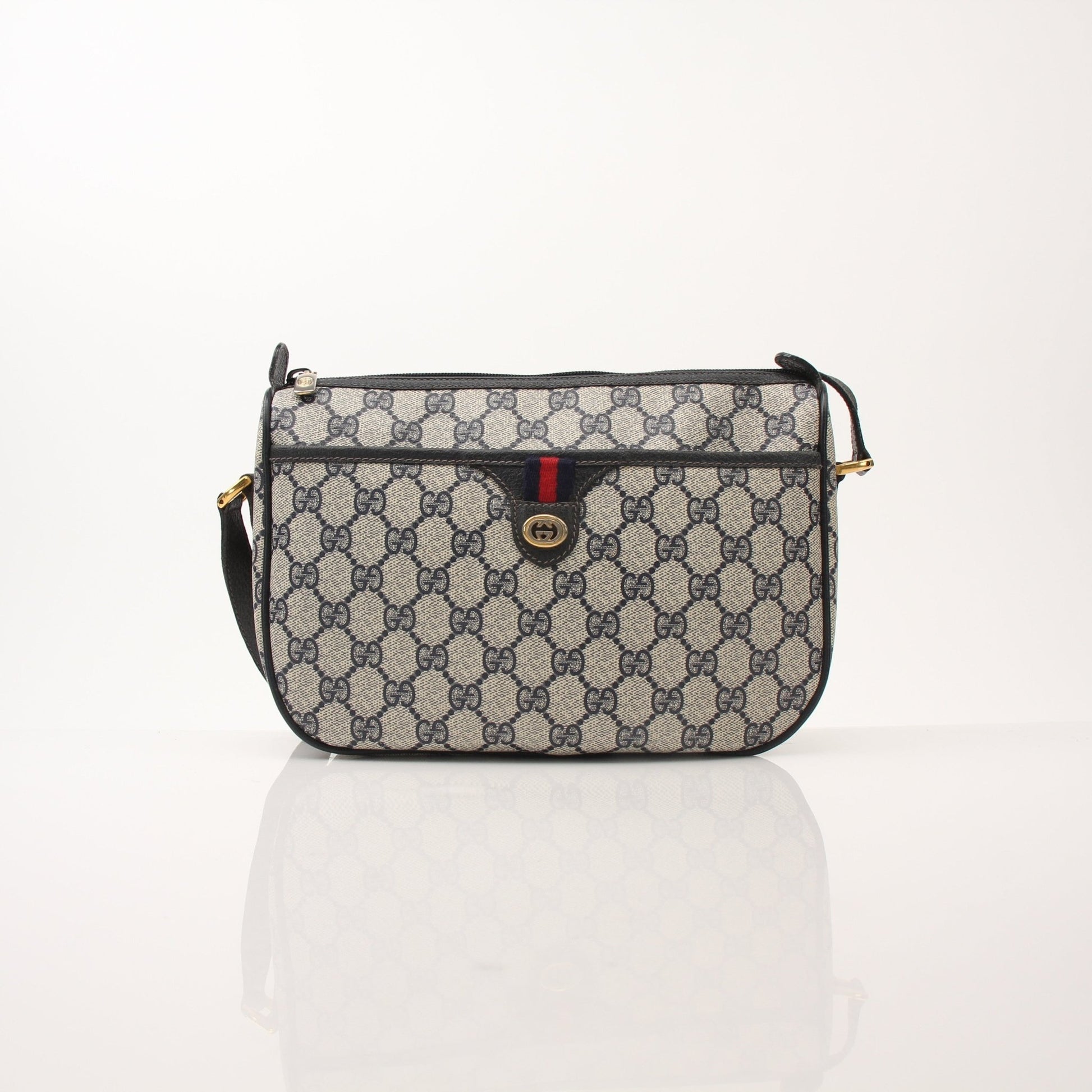 Gold & Beyond Gucci Sherry Line shoulder handbag with leather strap and signature logo detailing, stylish and elegant accessory.