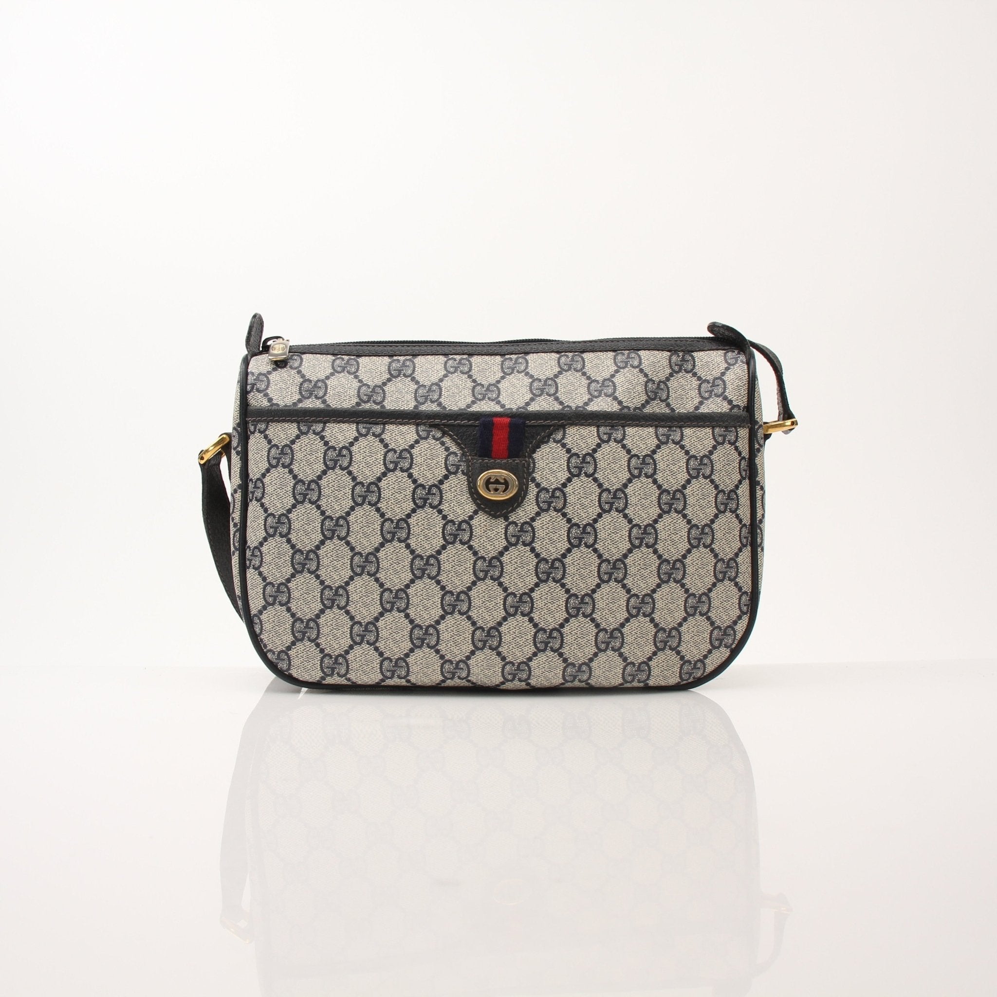 Gold & Beyond Gucci Sherry Line shoulder handbag with leather strap and signature logo detailing, stylish and elegant accessory.