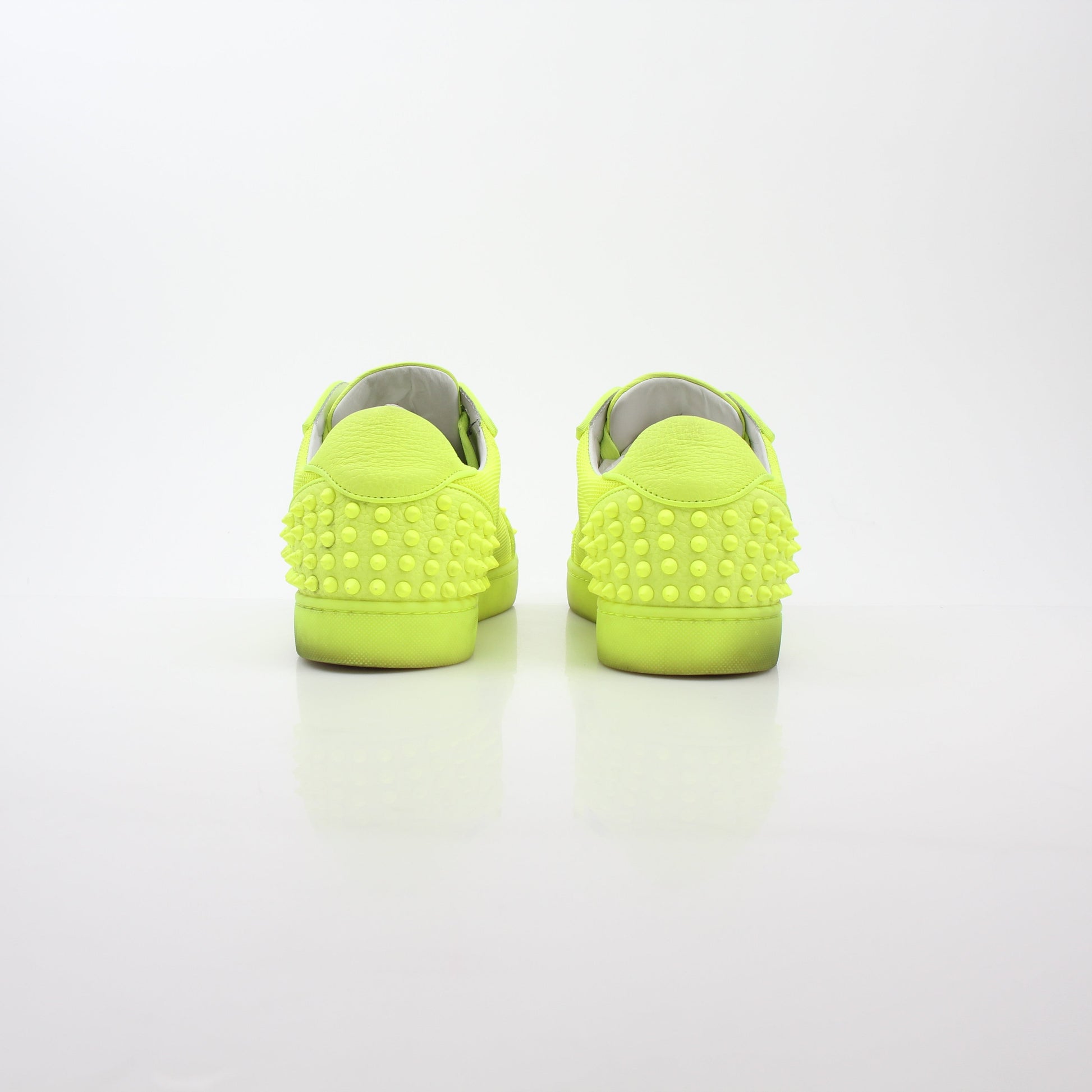 Christian Louboutin Neon Yellow Seavaste 2 Orlato sneakers with bold color and stylish design, showcasing the luxury shoes.