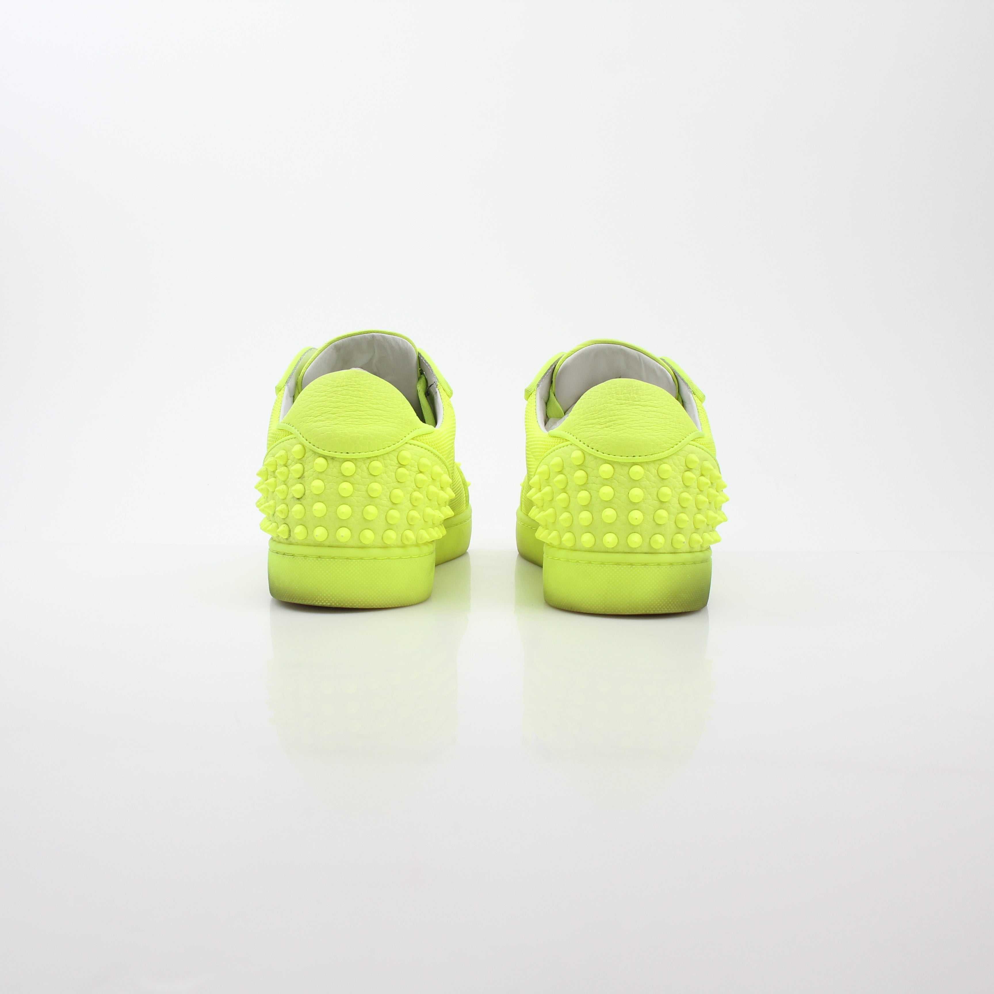 Christian Louboutin Neon Yellow Seavaste 2 Orlato sneakers with bold color and stylish design, showcasing the luxury shoes.