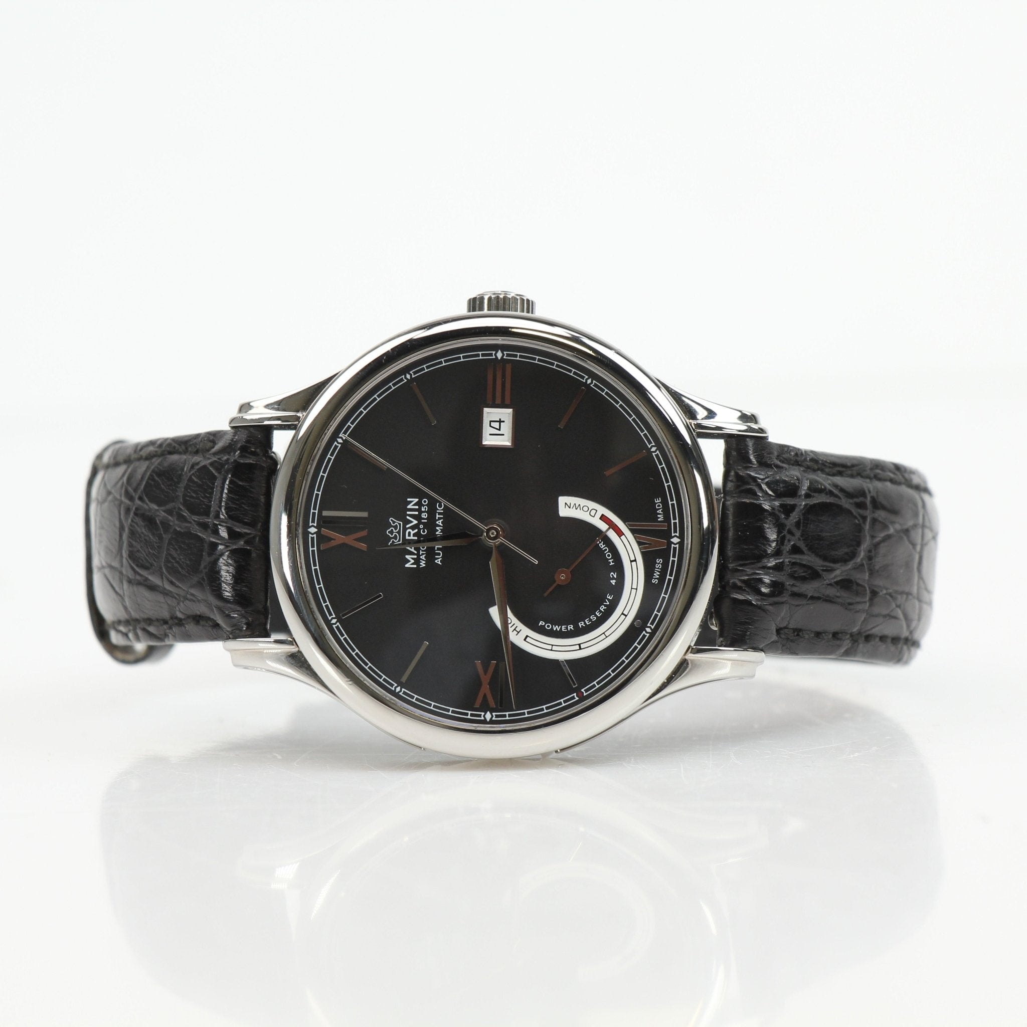 Gold & Beyond Marvin automatic dress watch with a sleek design, silver dial, and stainless steel band.
