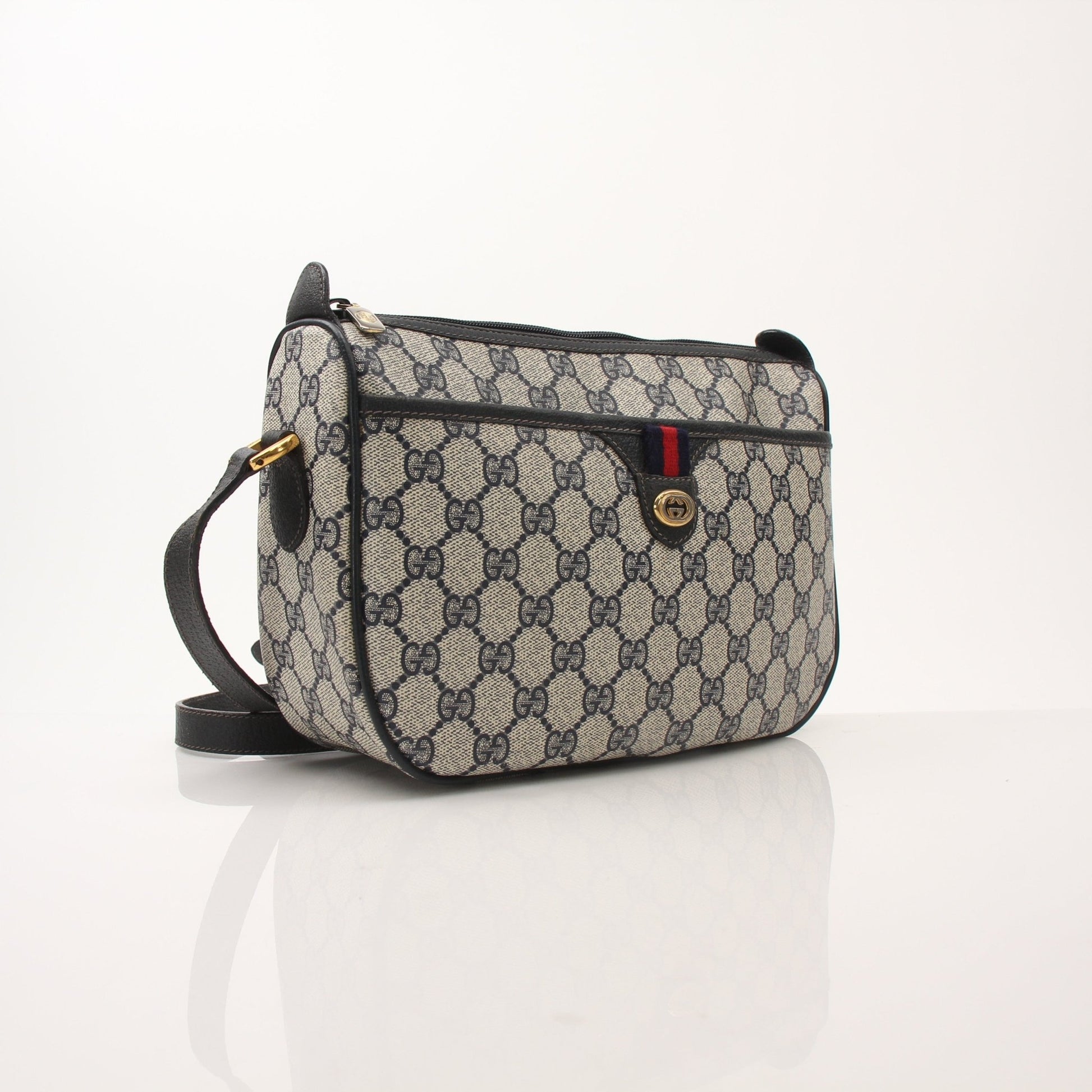 Gold & Beyond Gucci Sherry Line shoulder handbag with leather strap and gold-tone hardware.