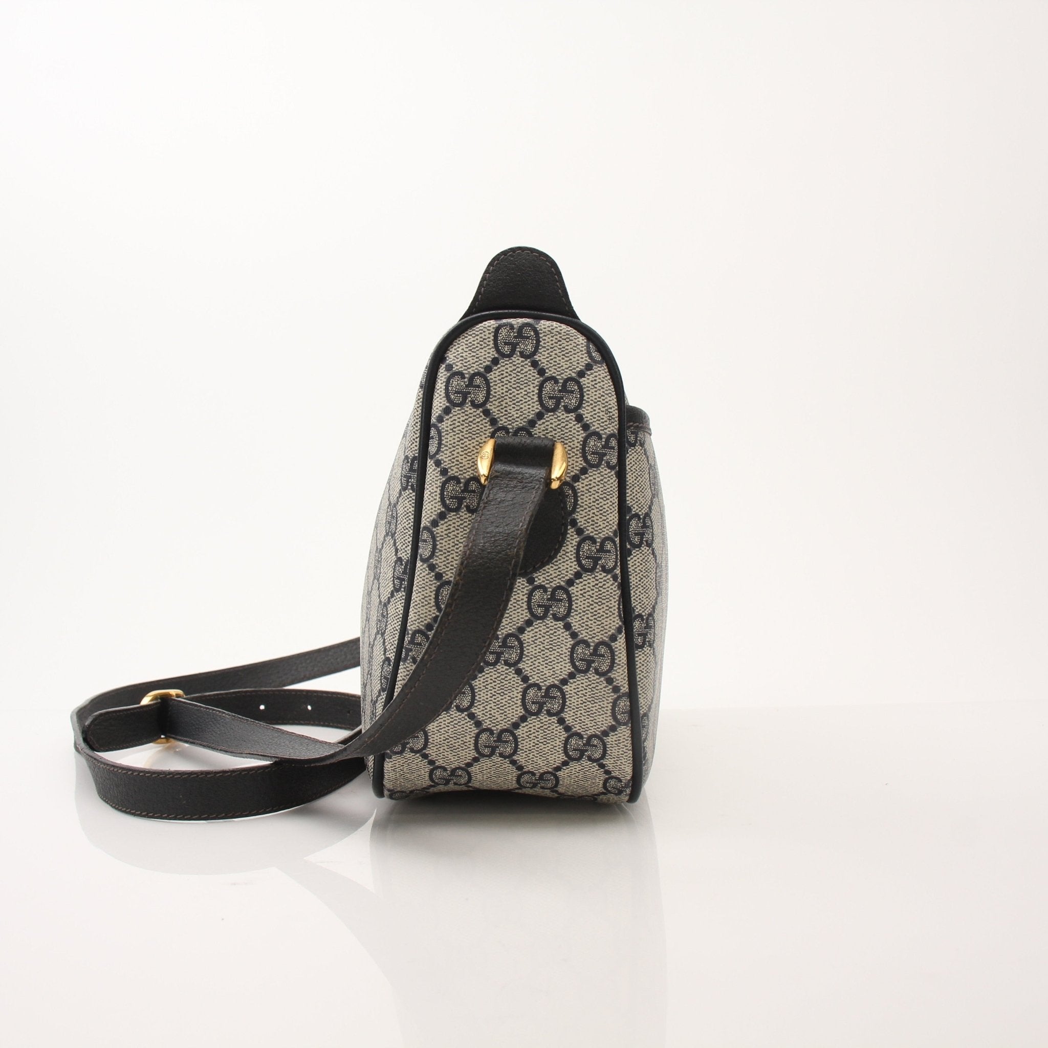 Gold & Beyond Gucci Sherry Line shoulder handbag with tan leather and gold hardware, showing its stylish design and top handle.