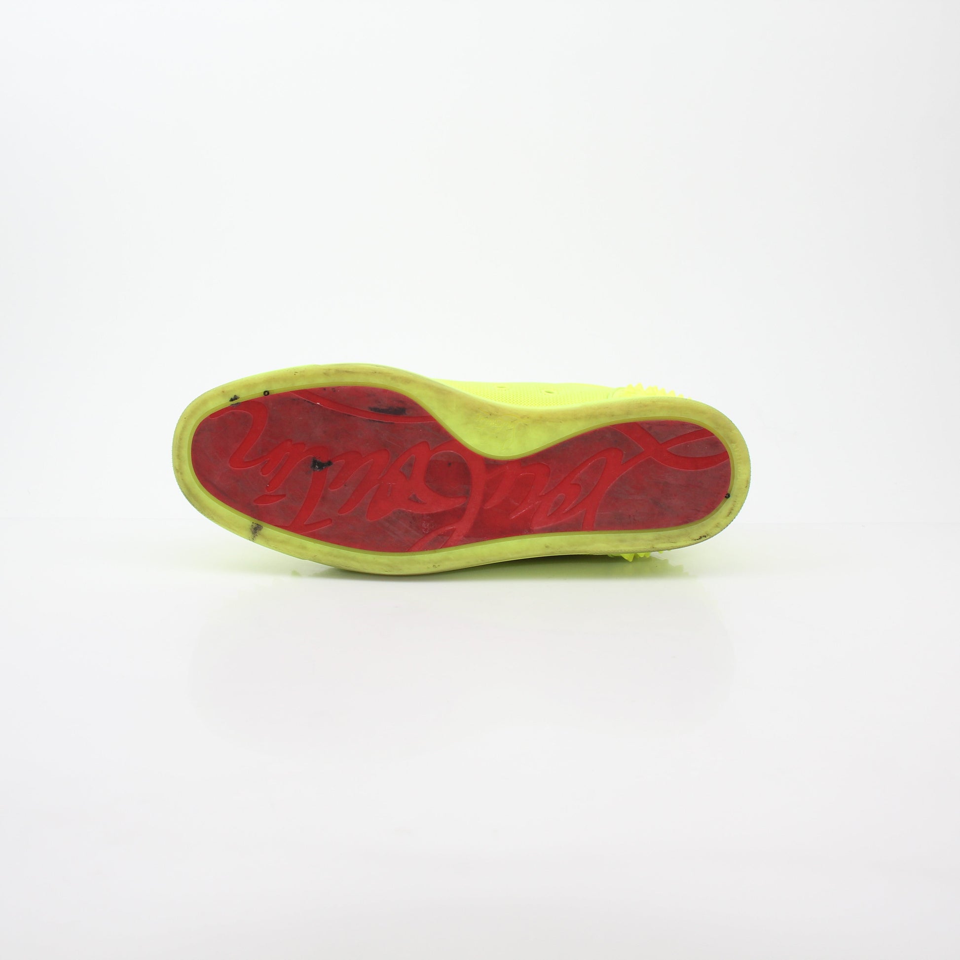 Christian Louboutin Neon Yellow Seavaste 2 Orlato sneakers with black accents and stylish design on white background.