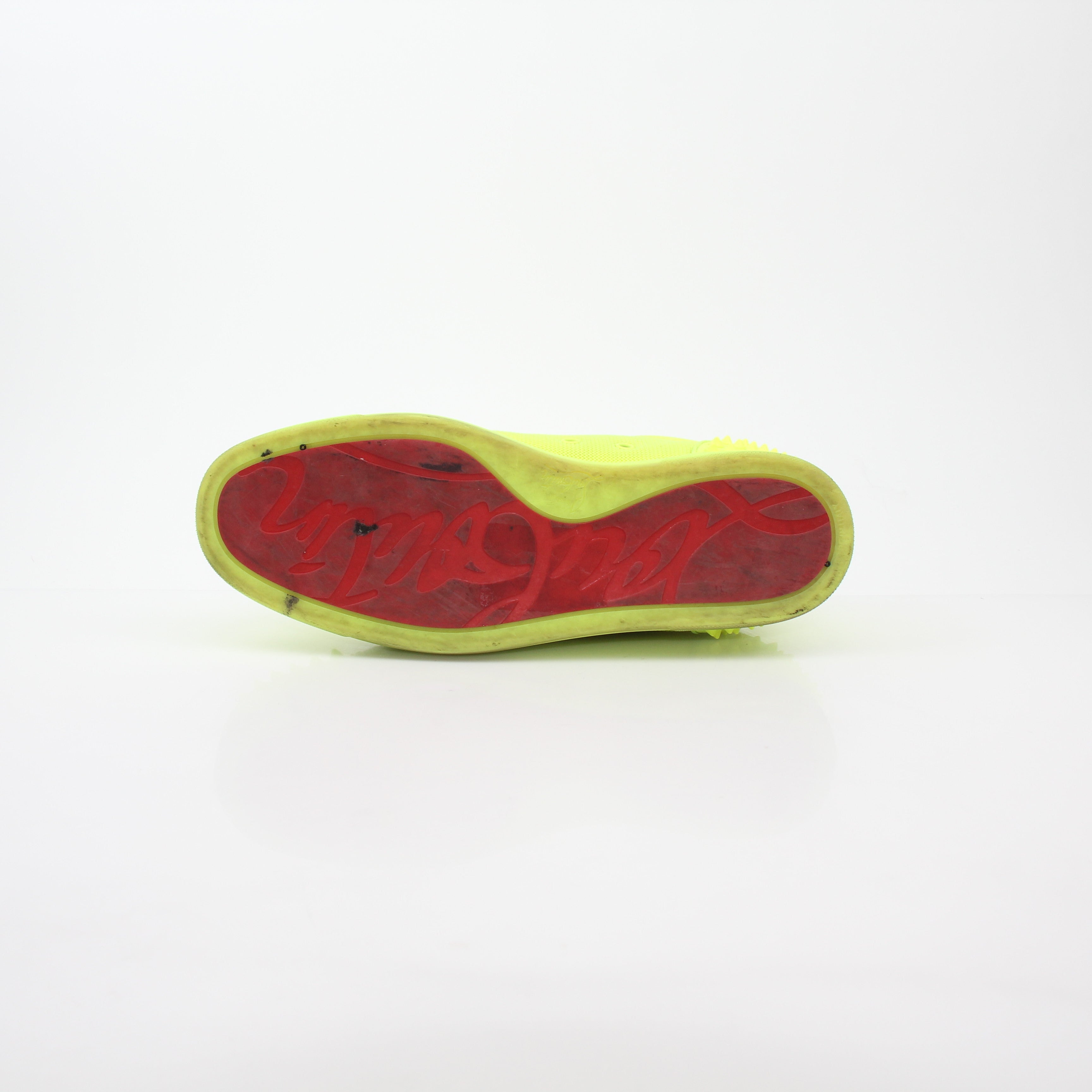 Christian Louboutin Neon Yellow Seavaste 2 Orlato sneakers with black accents and stylish design on white background.