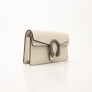 Gucci Super Mini Dionysus shoulder handbag with gold hardware and signature tiger head clasp, compact and stylish design.