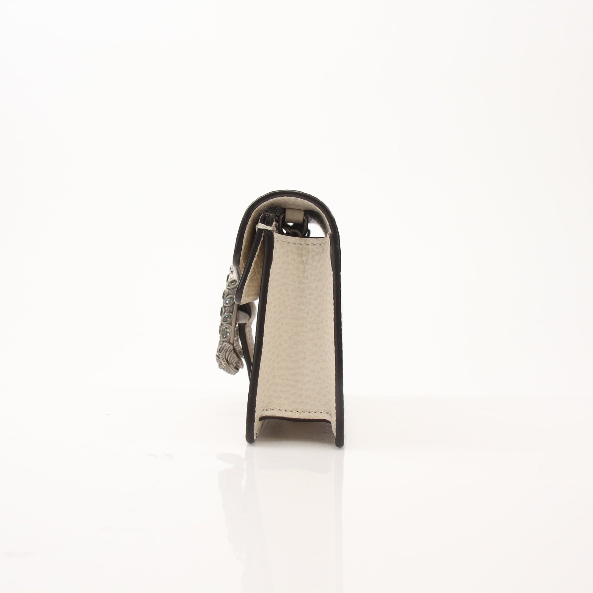 Gucci Super Mini Dionysus shoulder handbag with gold-tone hardware and textured leather, showcasing compact and stylish design.