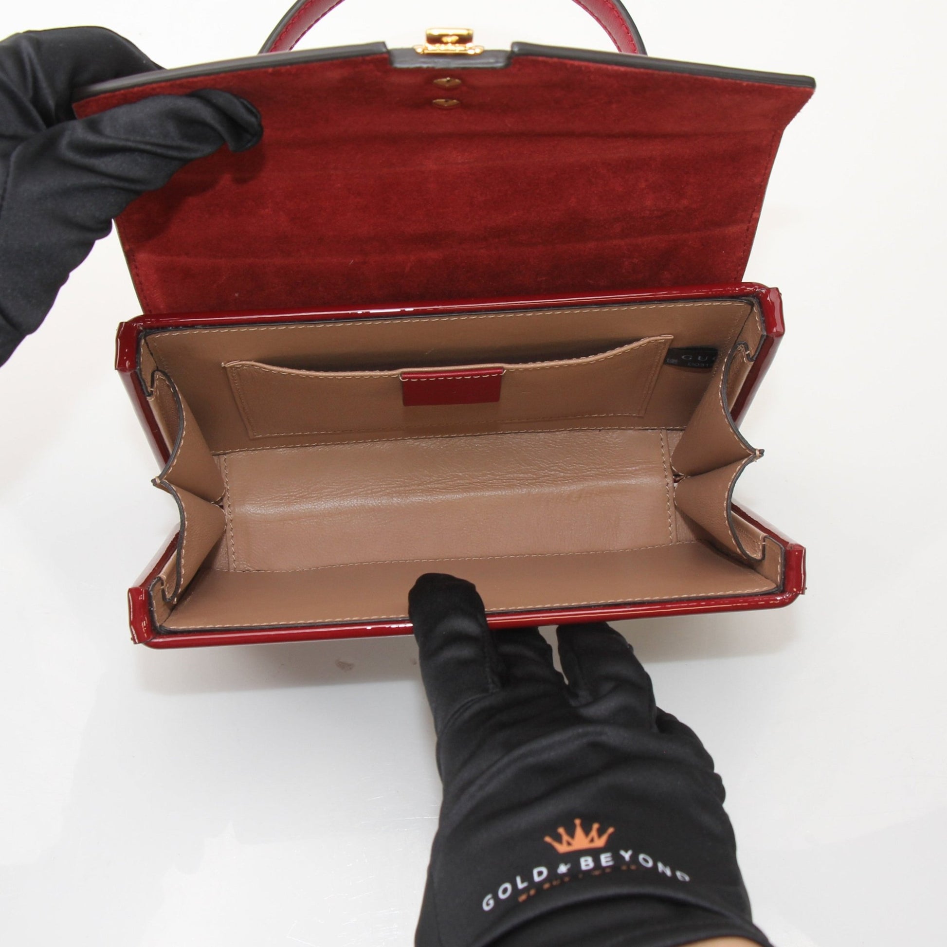 Gucci Sylvie 1969 Mini Top Handle Bag, elegant designer handbag with signature details, by Gold & Beyond.