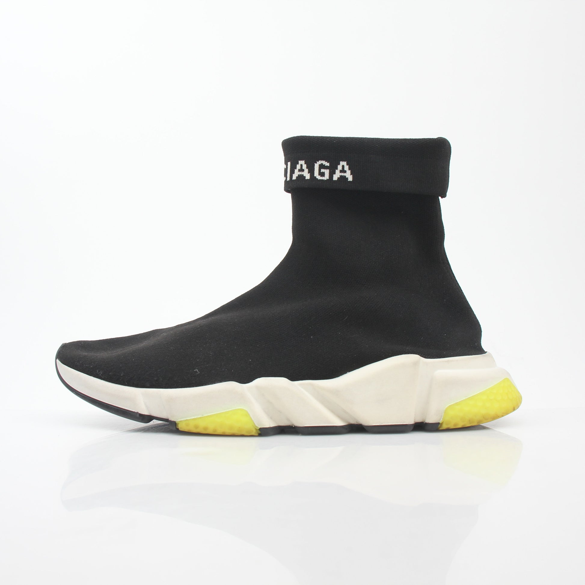 Black Balenciaga Speed 2.0 Turn Over Knit Sneakers on white background, showcasing sleek design and knit fabric details.