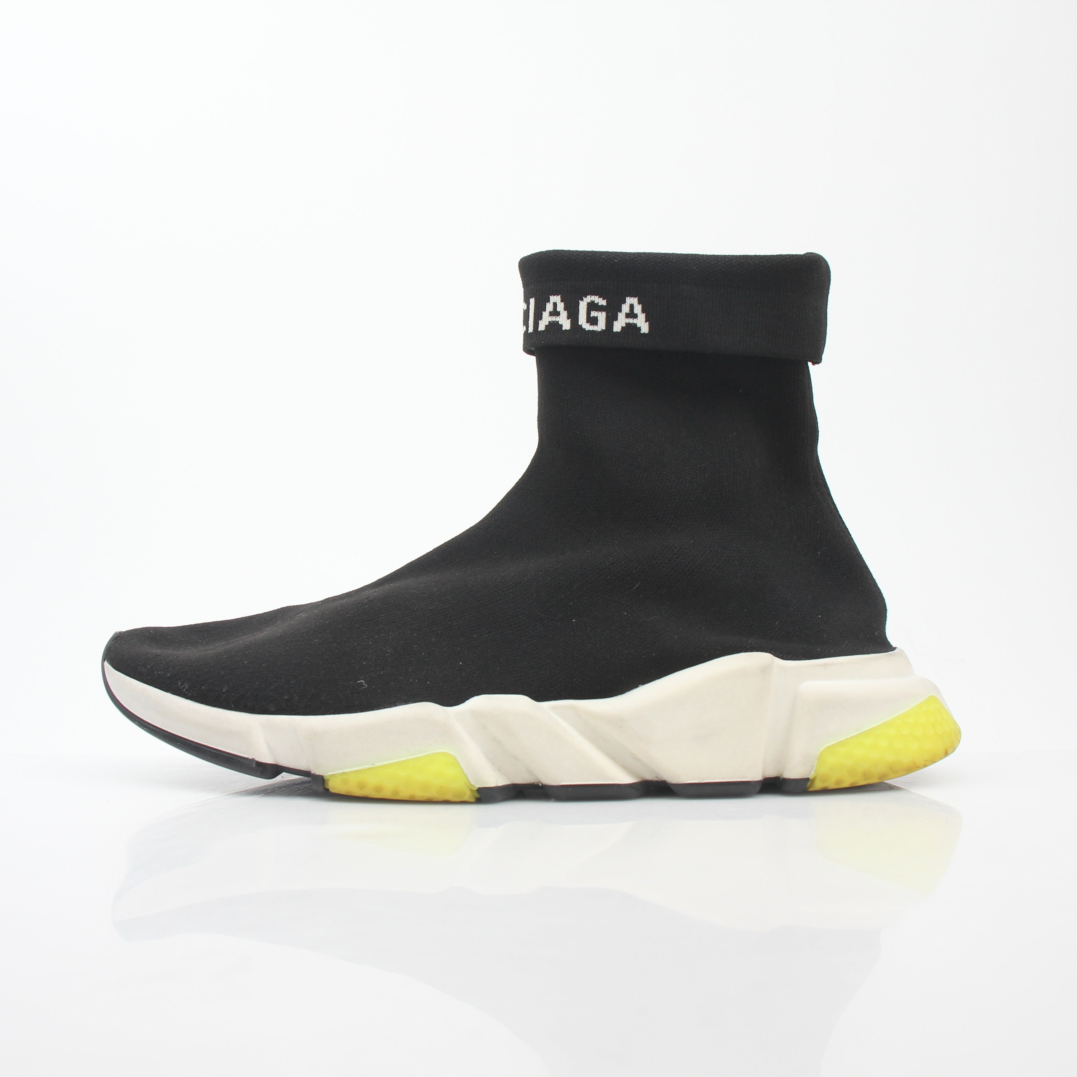 Black Balenciaga Speed 2.0 Turn Over Knit Sneakers on white background, showcasing sleek design and knit fabric details.