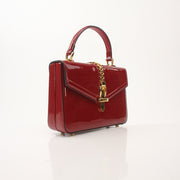 Gold & Beyond Gucci Sylvie 1969 Mini Handbag with top handle, featuring signature design and elegant gold accents.