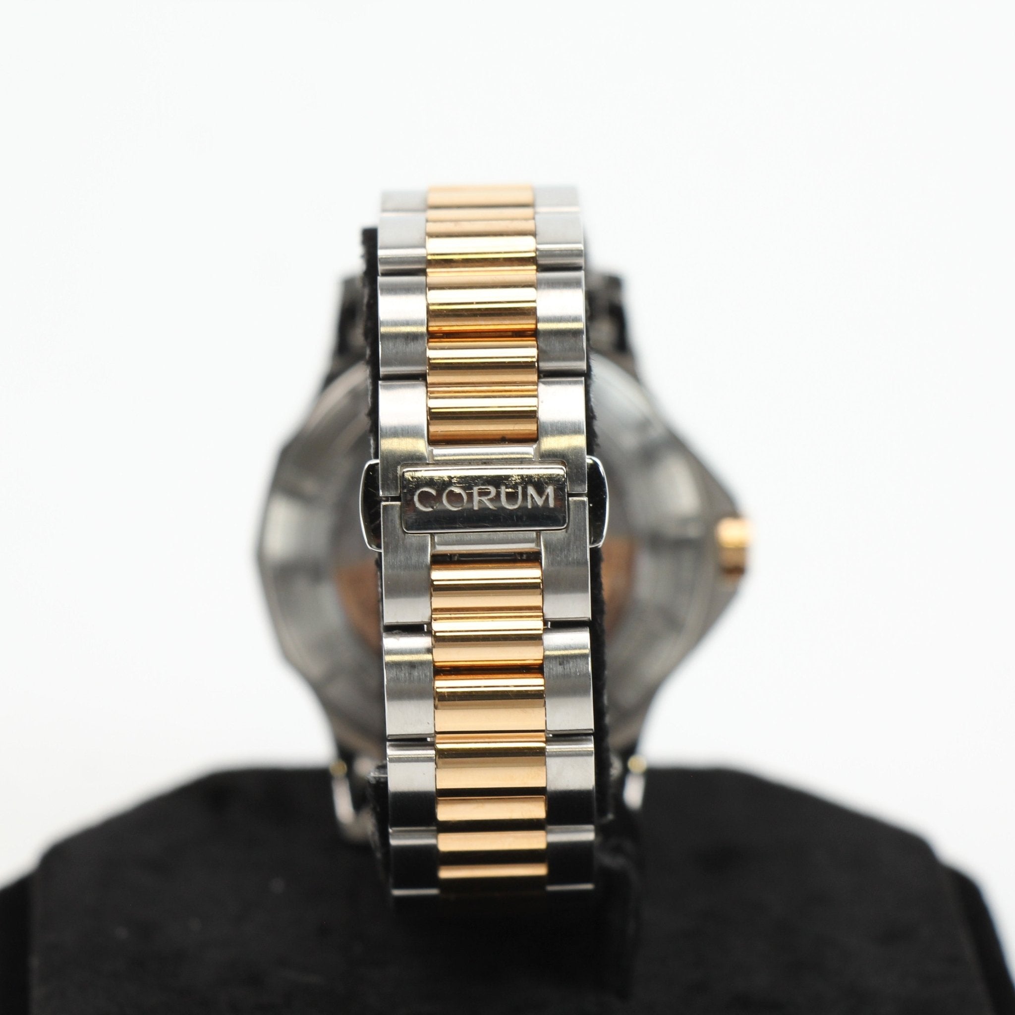 Gold & Beyond Corum Admiral’s Cup diamond watch featuring a sleek watch face with diamond accents and stainless steel strap.