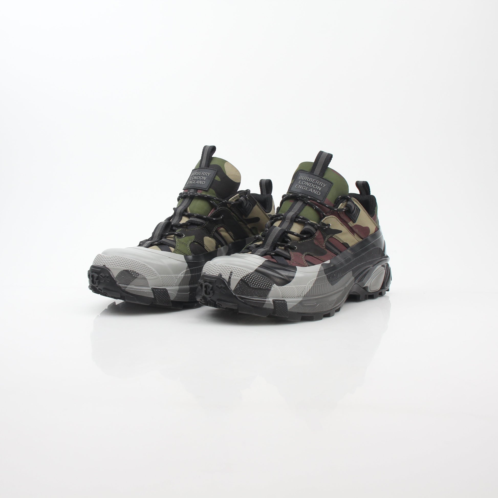 Gold & Beyond camouflage Arthur low-top sneakers by Burberry featuring a stylish camouflage print and classic lace-up design.