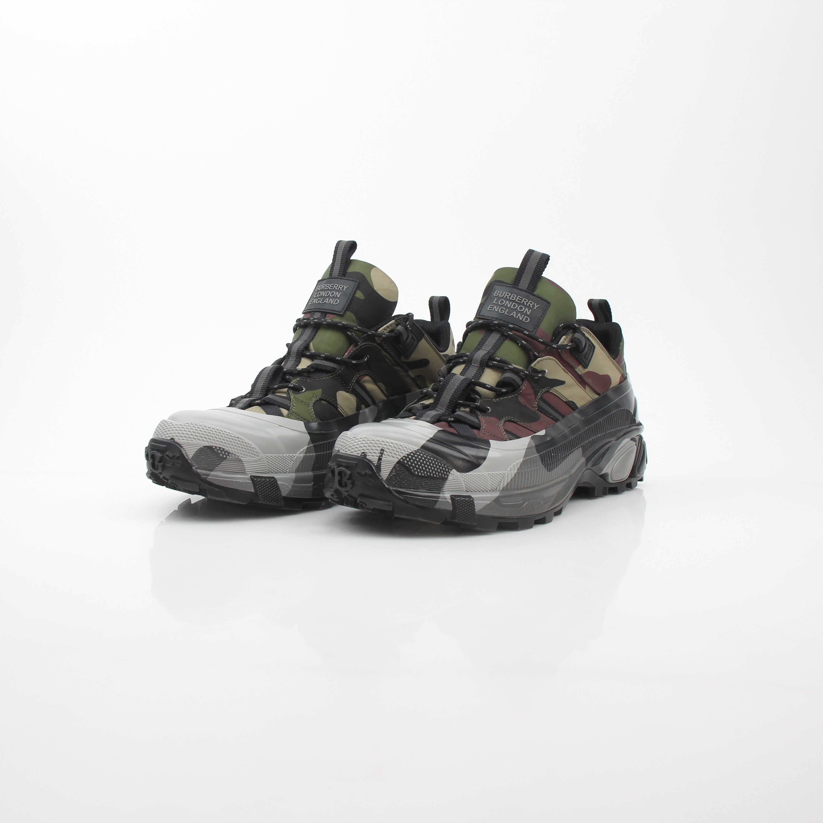 Gold & Beyond camouflage Arthur low-top sneakers by Burberry featuring a stylish camouflage print and classic lace-up design.