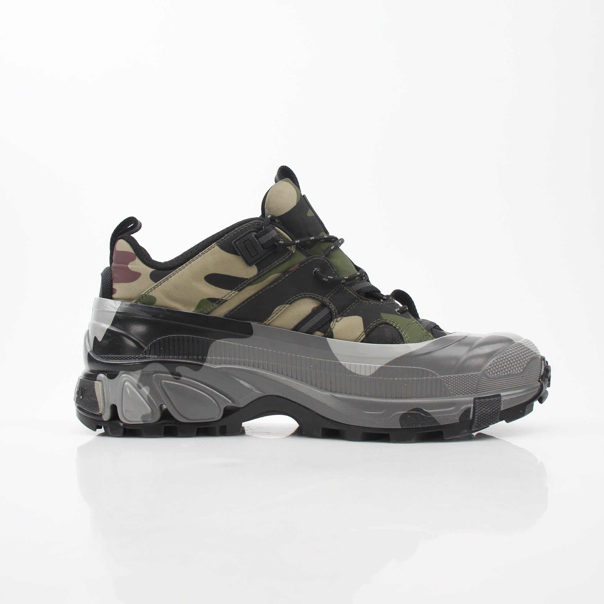 Gold & Beyond Burberry Camouflage Arthur low-top sneakers with green, brown, and black camouflage pattern and white rubber soles.