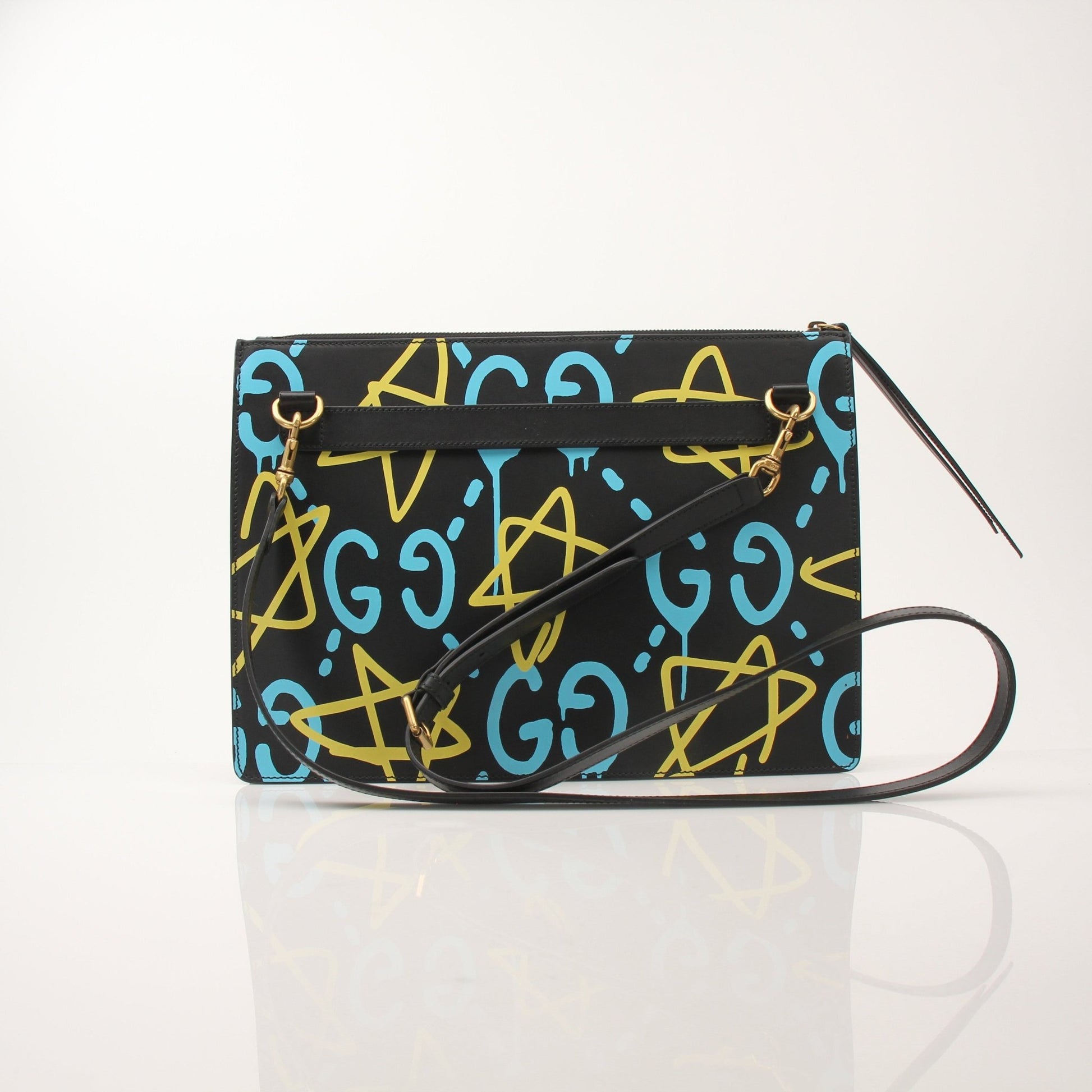Gold & Beyond Gucci Ghost Messenger Bag, a stylish handbag with a sleek design and adjustable strap, shown in the image.