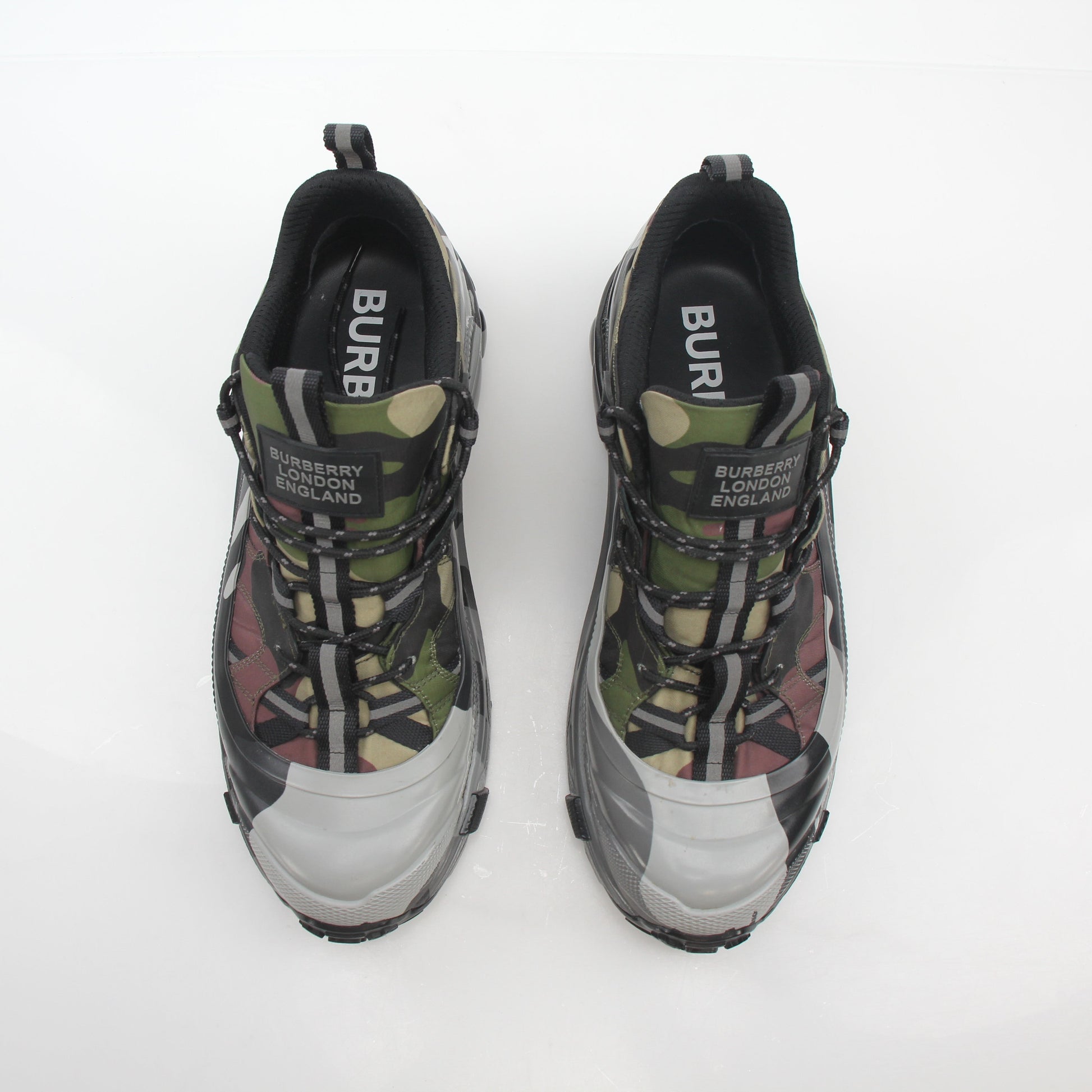 Gold & Beyond camouflage Burberry Arthur low-top sneakers with gold accents, featuring a stylish print and casual shoe design.