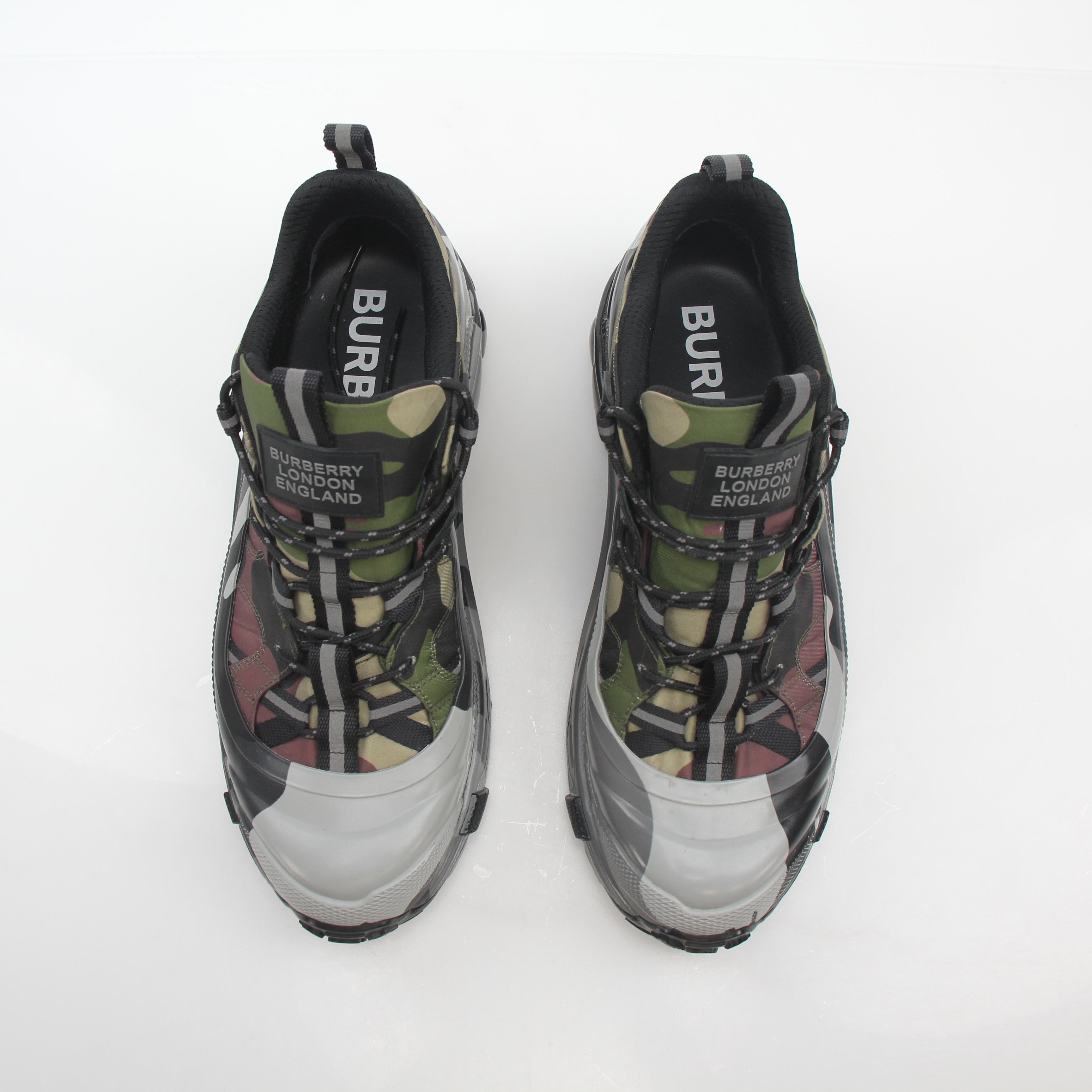 Gold & Beyond camouflage Burberry Arthur low-top sneakers with gold accents, featuring a stylish print and casual shoe design.