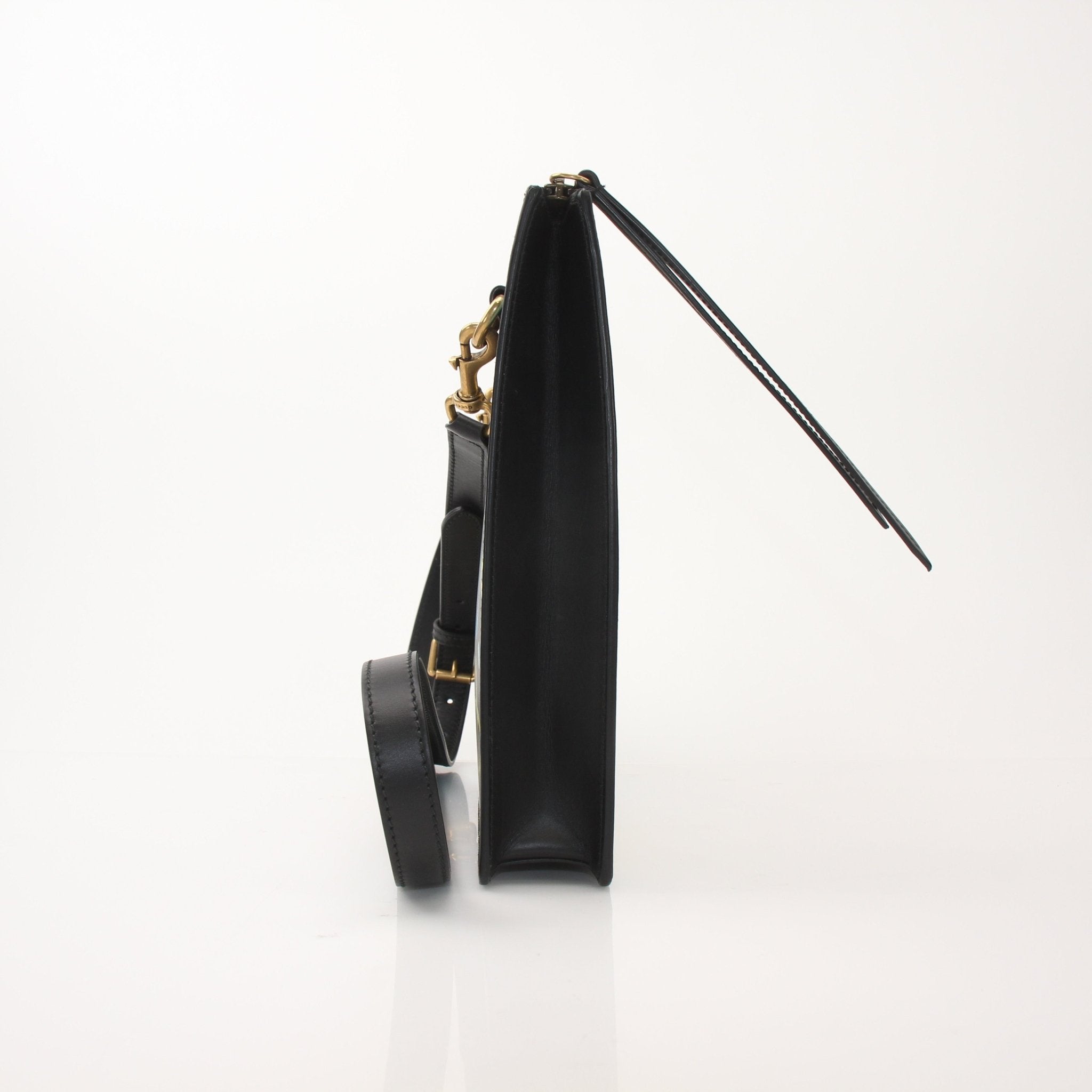 Gold & Beyond Gucci Ghost messenger handbag with adjustable strap and signature design, displayed on a plain background.
