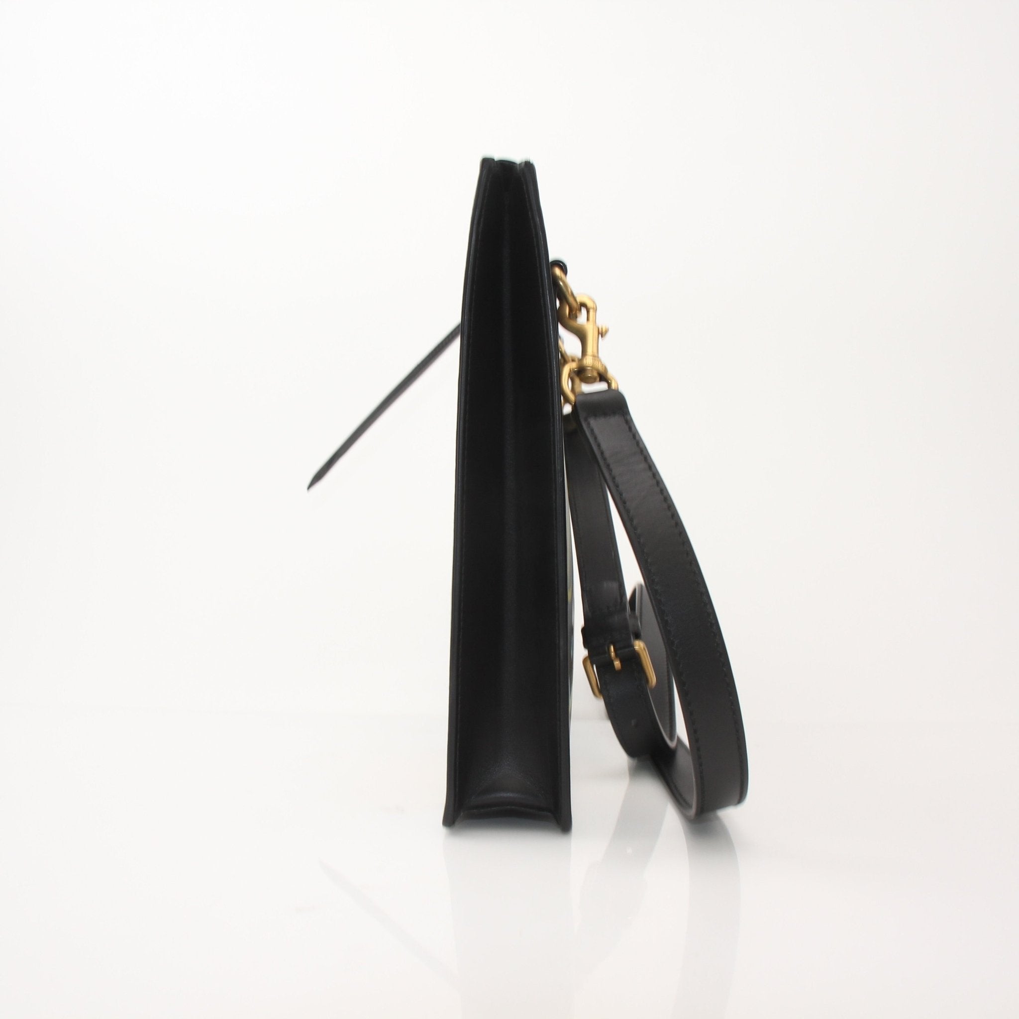 Gucci Ghost messenger handbag by Gold & Beyond, featuring a sleek design with GG logo pattern and adjustable strap.