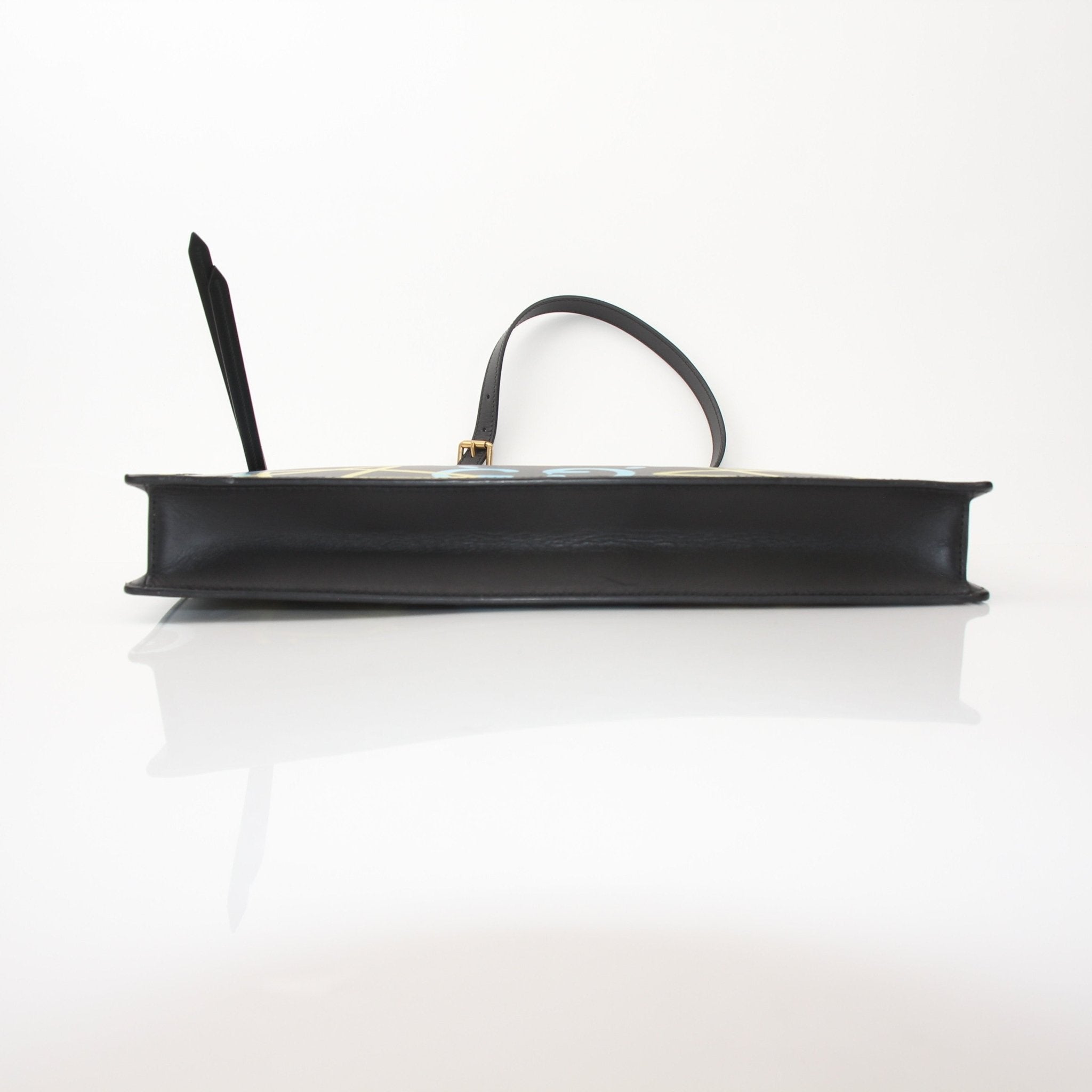 Gucci Ghost messenger handbag with black leather strap and silver hardware, featuring the iconic ghost logo design.