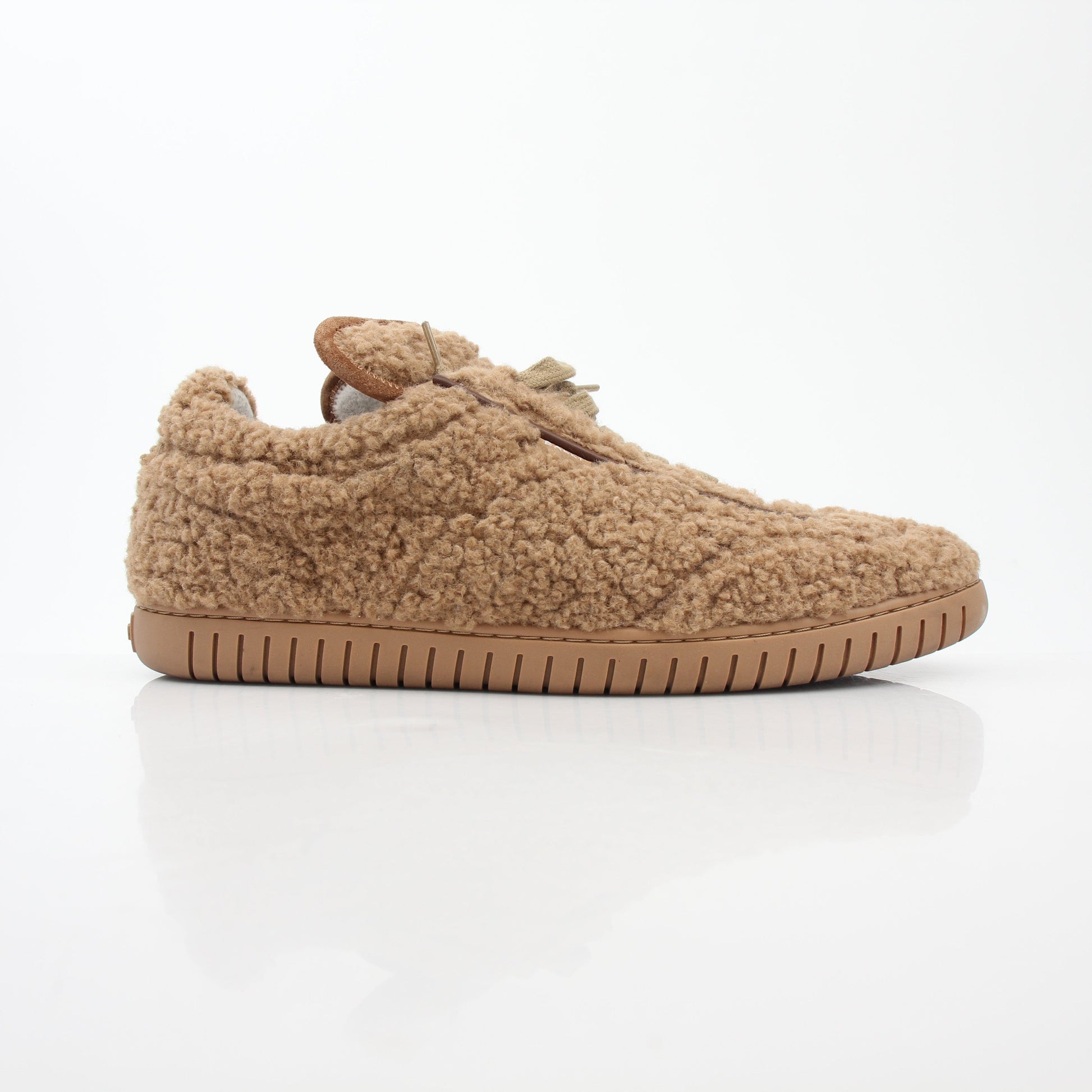 Gold & Beyond Bally beige teddy shearling low-top sneakers with soft furry lining and casual shoe design.