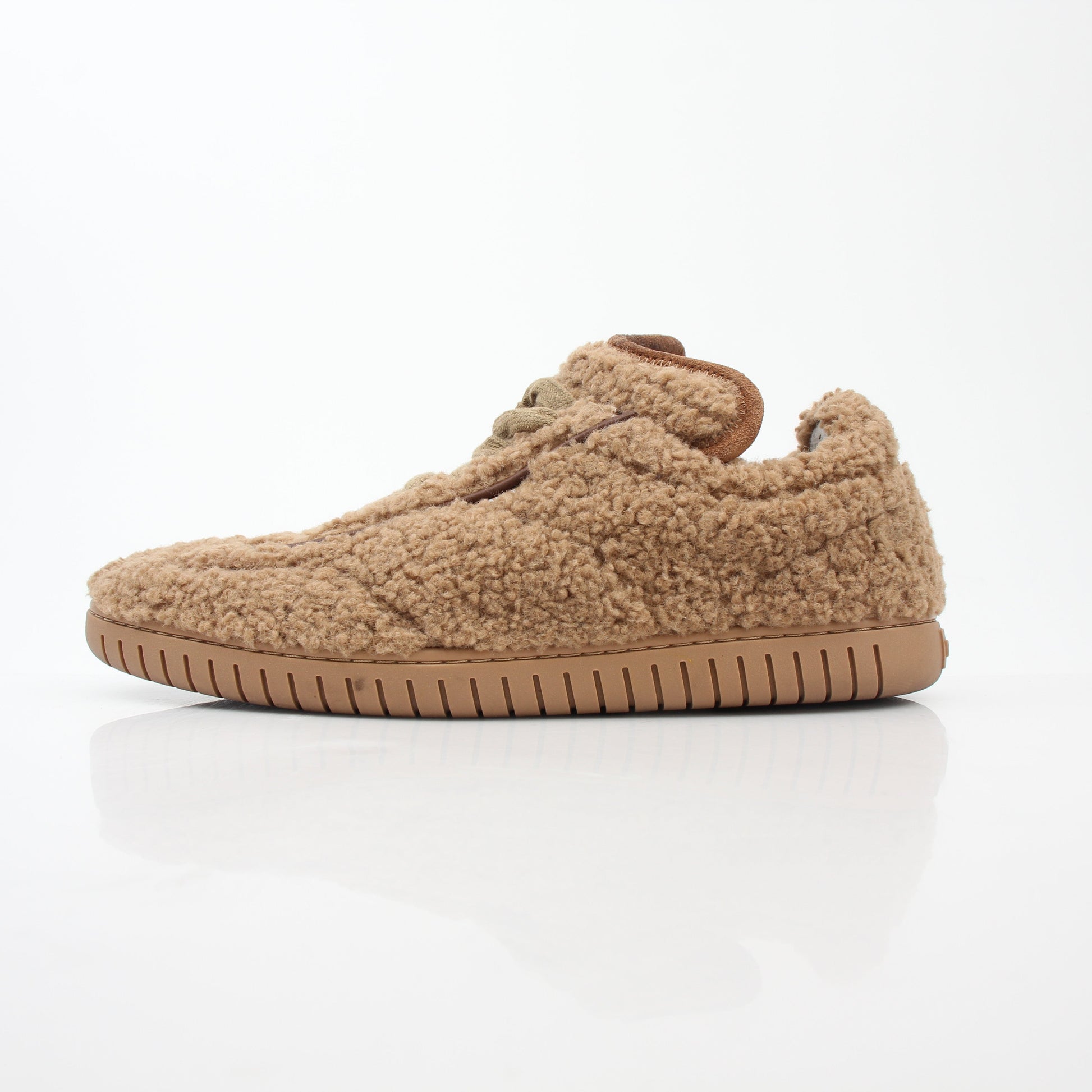 Gold & Beyond Bally beige teddy shearling low-top sneakers with soft shearling lining and casual shoe design.