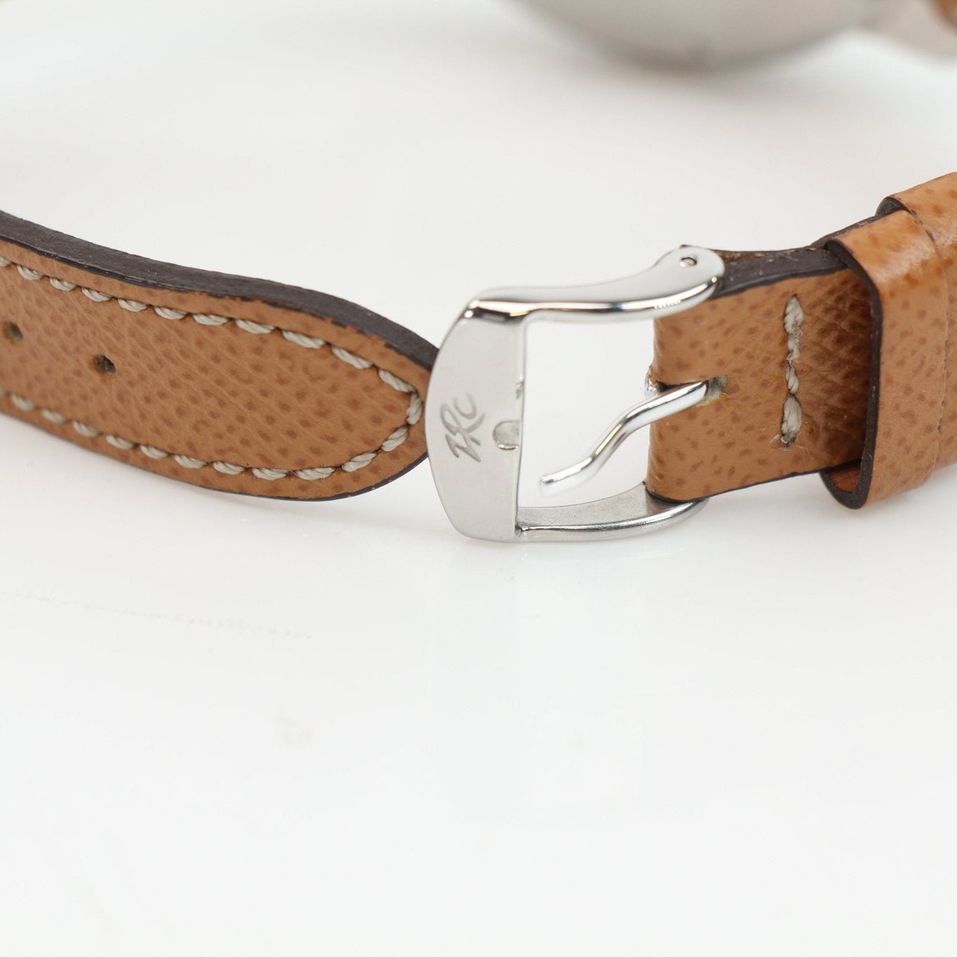 Gold & Beyond Bucherer Vintage Chronograph watch with black dial, stainless steel case, and leather strap.