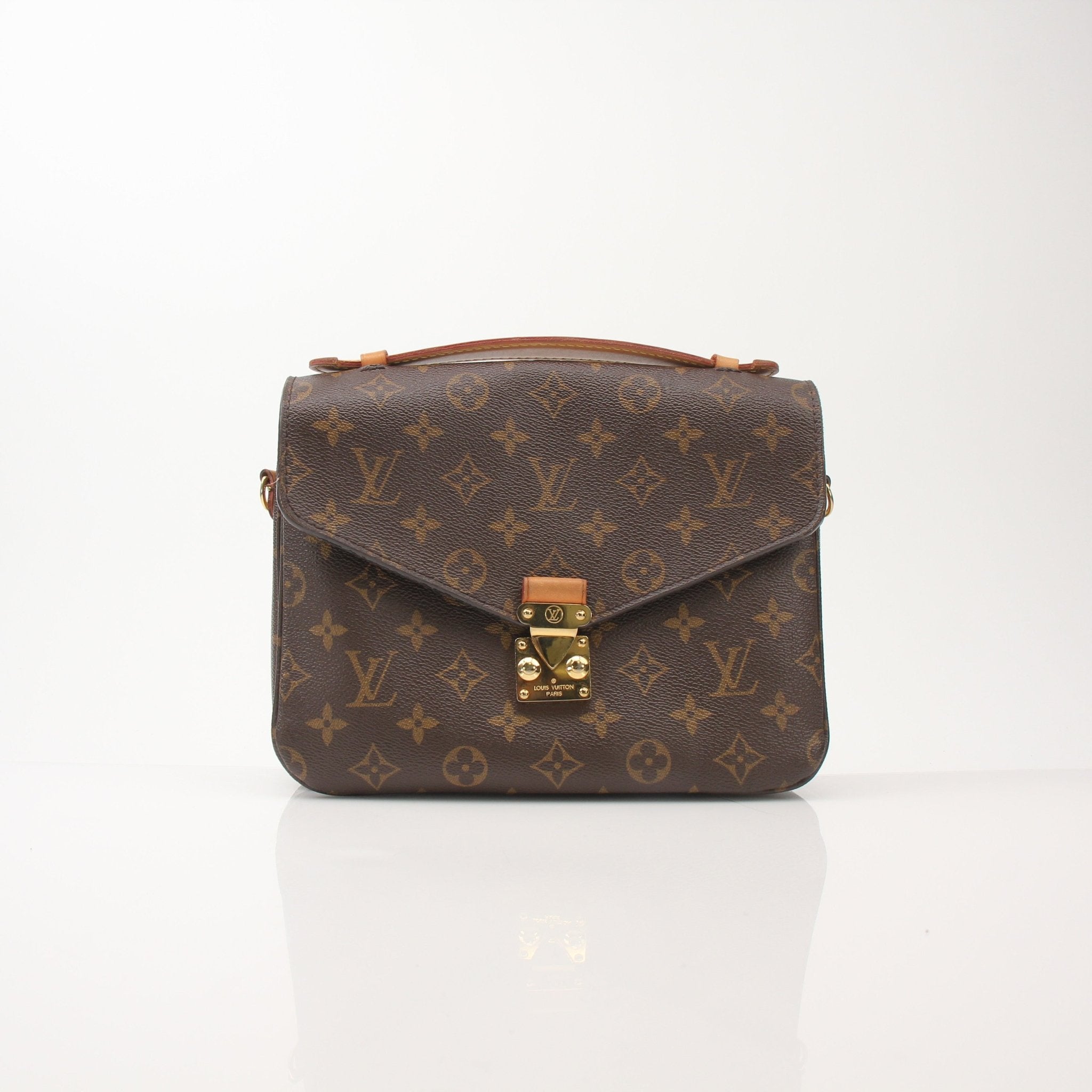 Louis Vuitton Monogram Pochette Métis handbag with gold-tone hardware and adjustable strap, showcasing iconic monogram canvas.