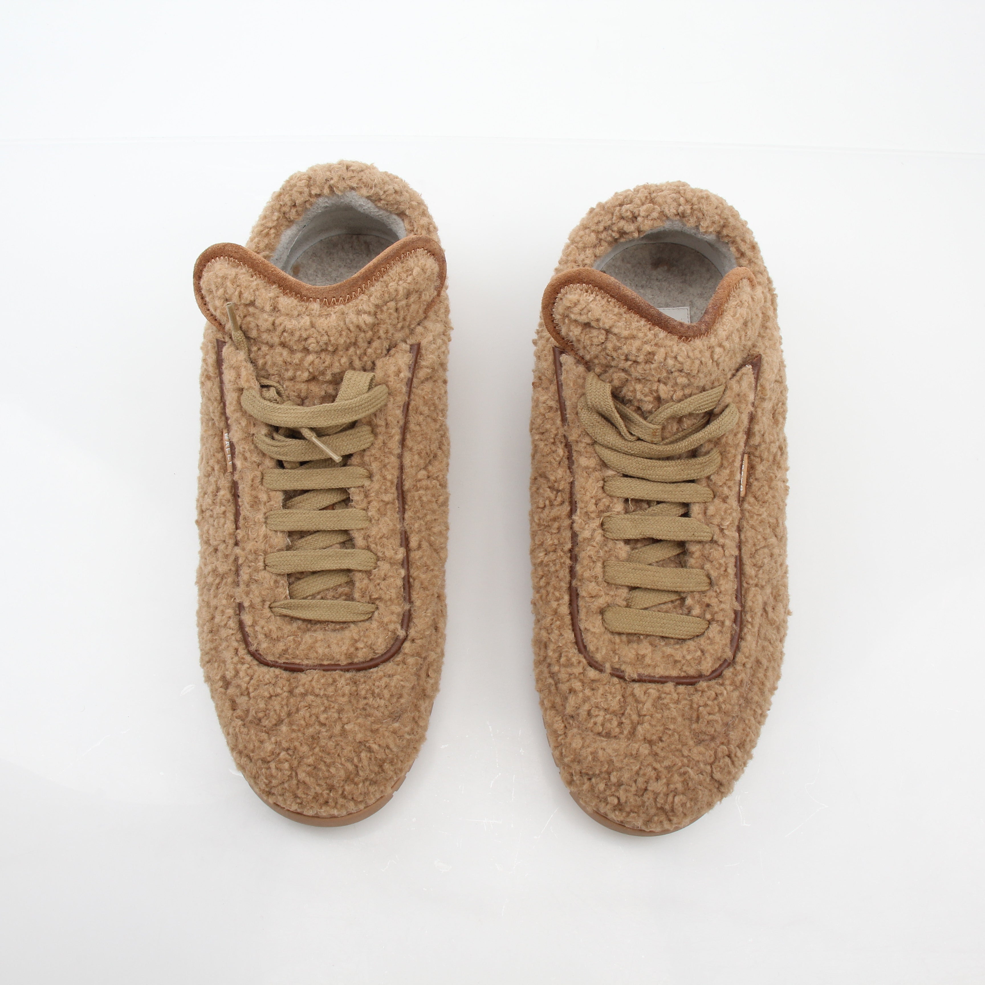 Gold & Beyond Bally beige teddy shearling low-top sneakers with cozy shearling lining and casual sneaker design.