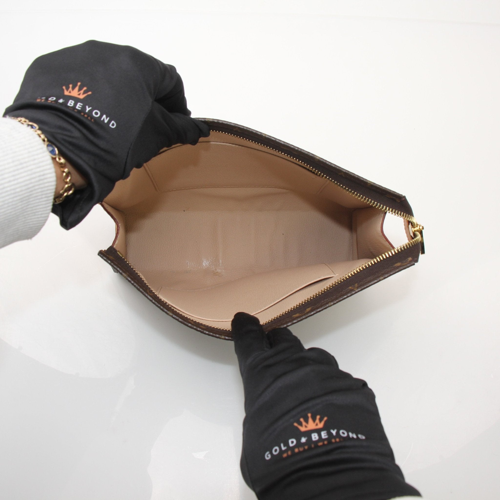 Louis Vuitton Monogram Toiletry Pouch GM vanity case with gold accents, featuring the signature monogram canvas and leather trim.