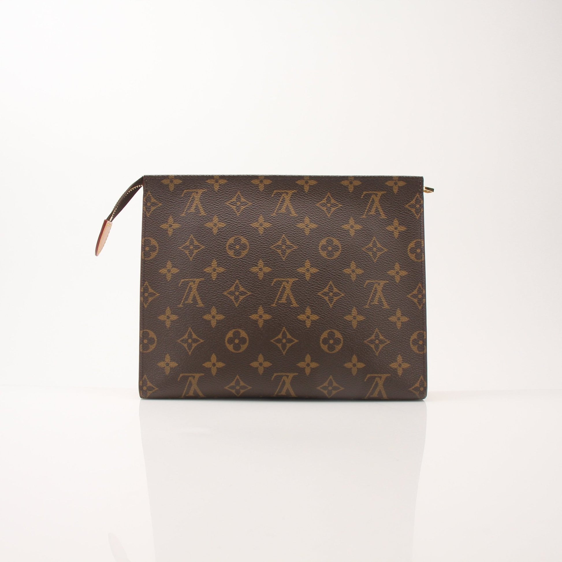Louis Vuitton Monogram Toiletry Pouch GM vanity case with gold hardware, featuring the iconic monogram pattern and zipper closure.