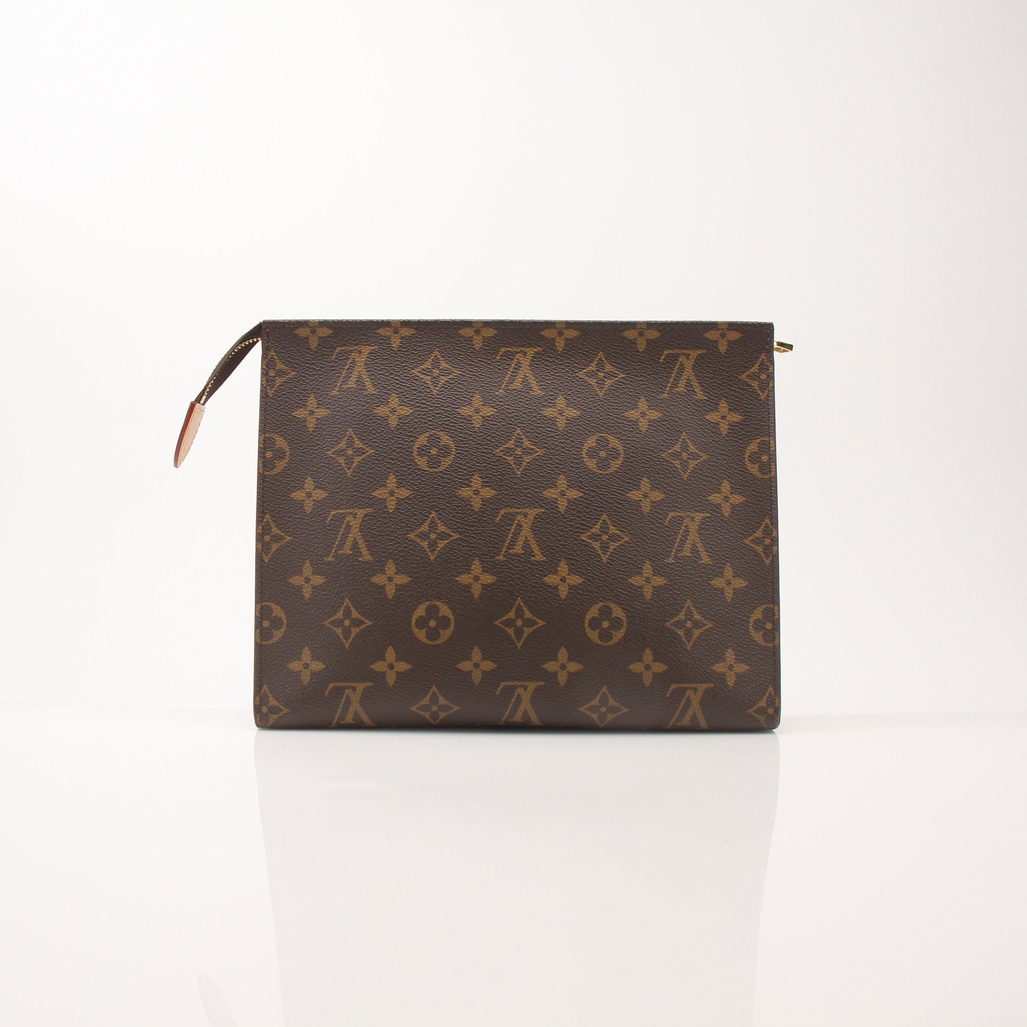 Louis Vuitton Monogram Toiletry Pouch GM vanity case with gold hardware, featuring the iconic monogram pattern and zipper closure.