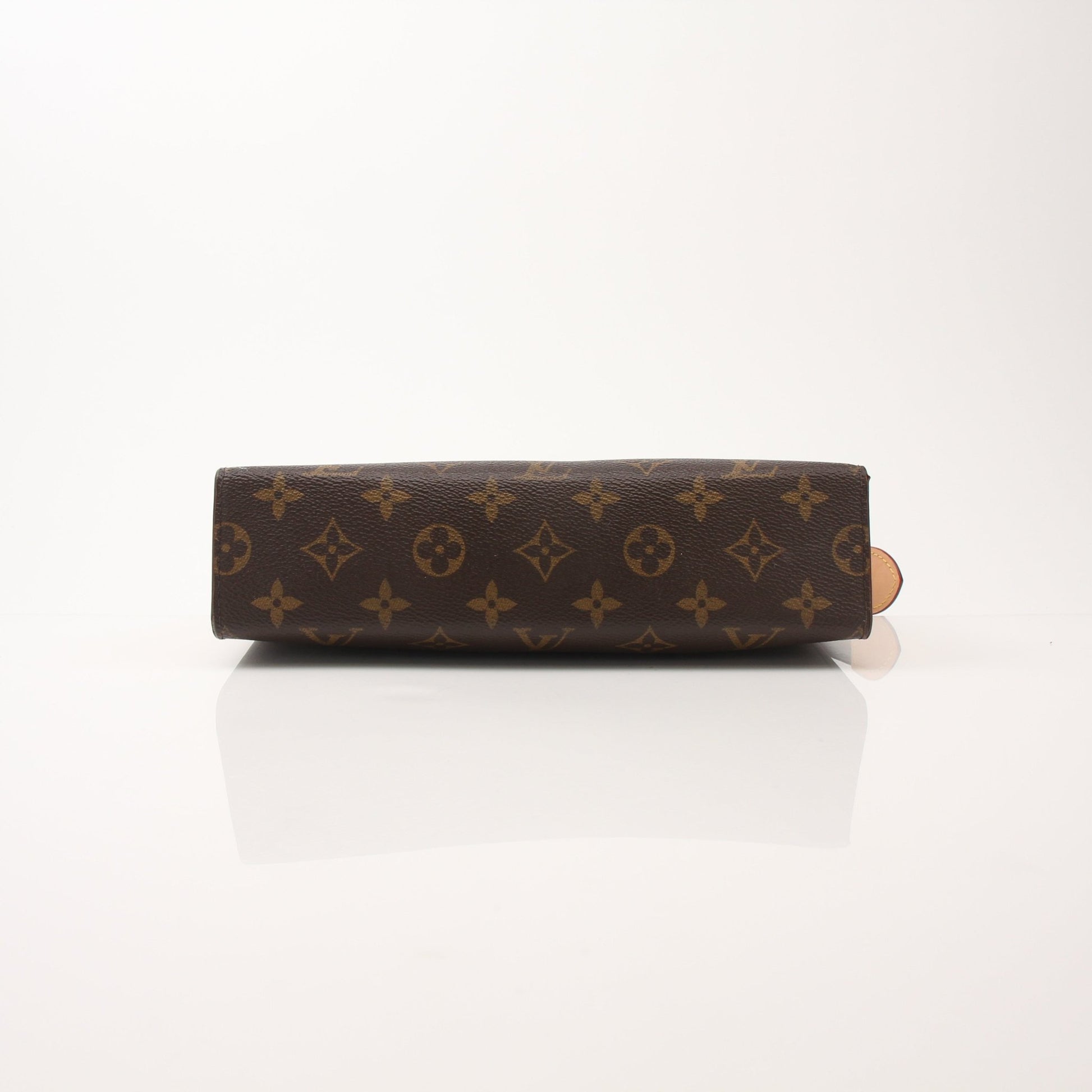 Louis Vuitton Monogram Toiletry Pouch GM vanity case with gold accents, featuring signature monogram canvas and zipper closure.