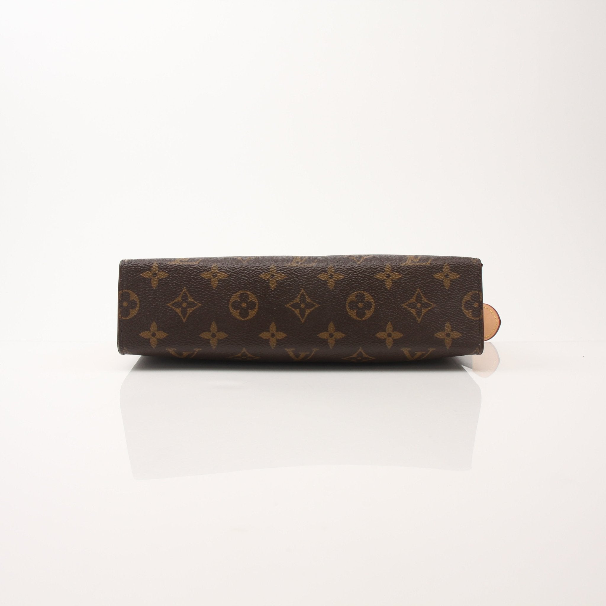 Louis Vuitton Monogram Toiletry Pouch GM vanity case with gold accents, featuring signature monogram canvas and zipper closure.