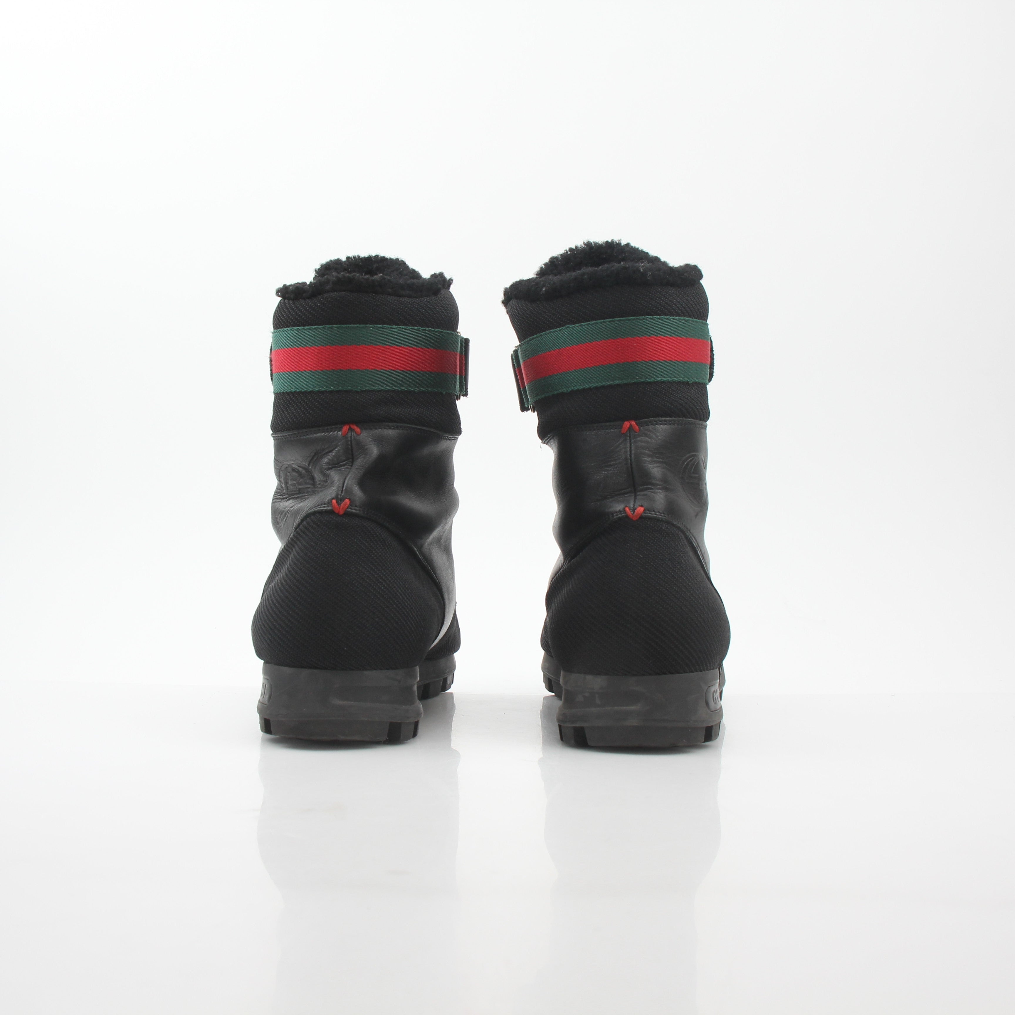 Gucci black Web accent combat boots from Gold & Beyond, stylish shoes with rugged design and signature web details.