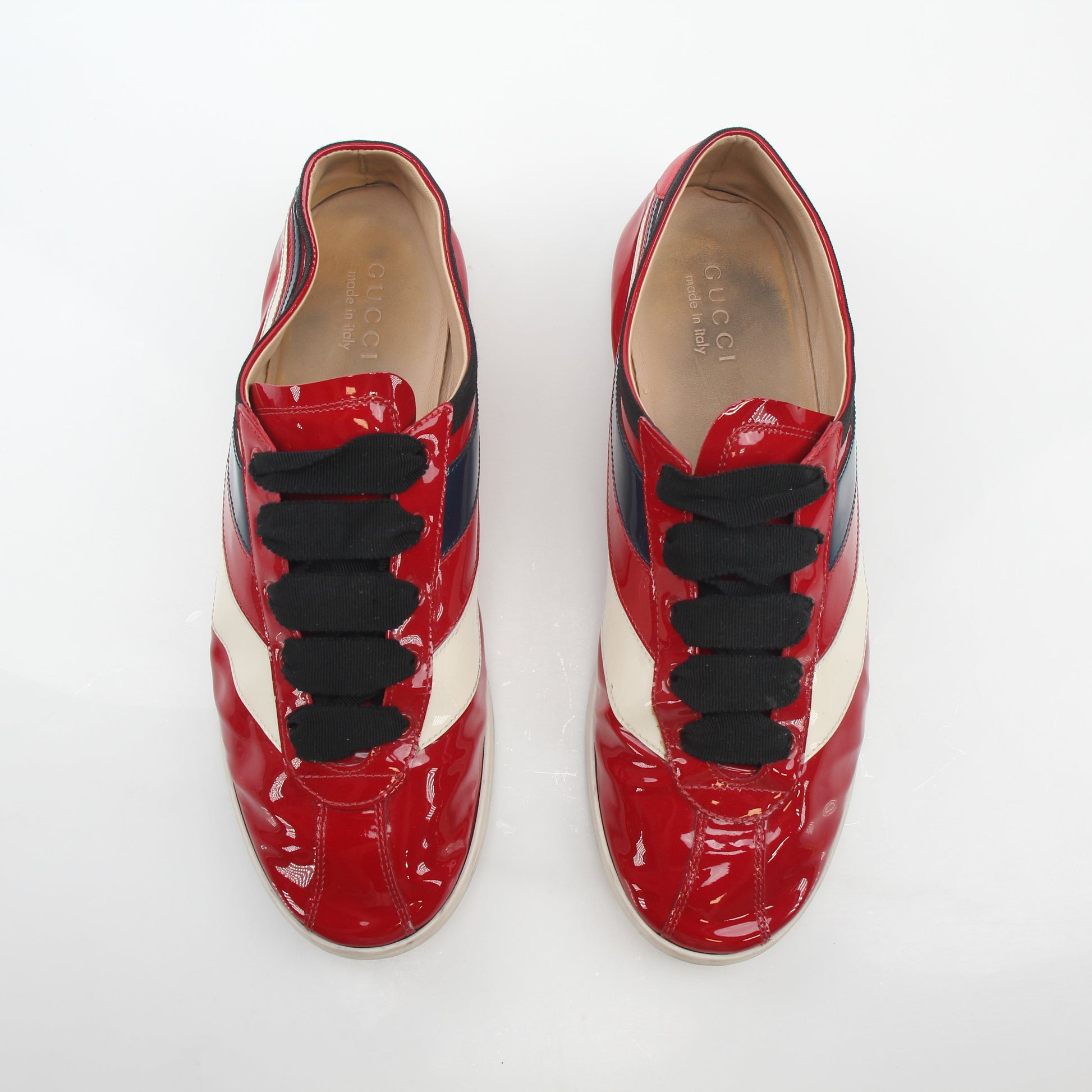 Gucci Red Falacer Hebron Web sneakers, stylish shoes with red and web detailing, displayed on a plain background