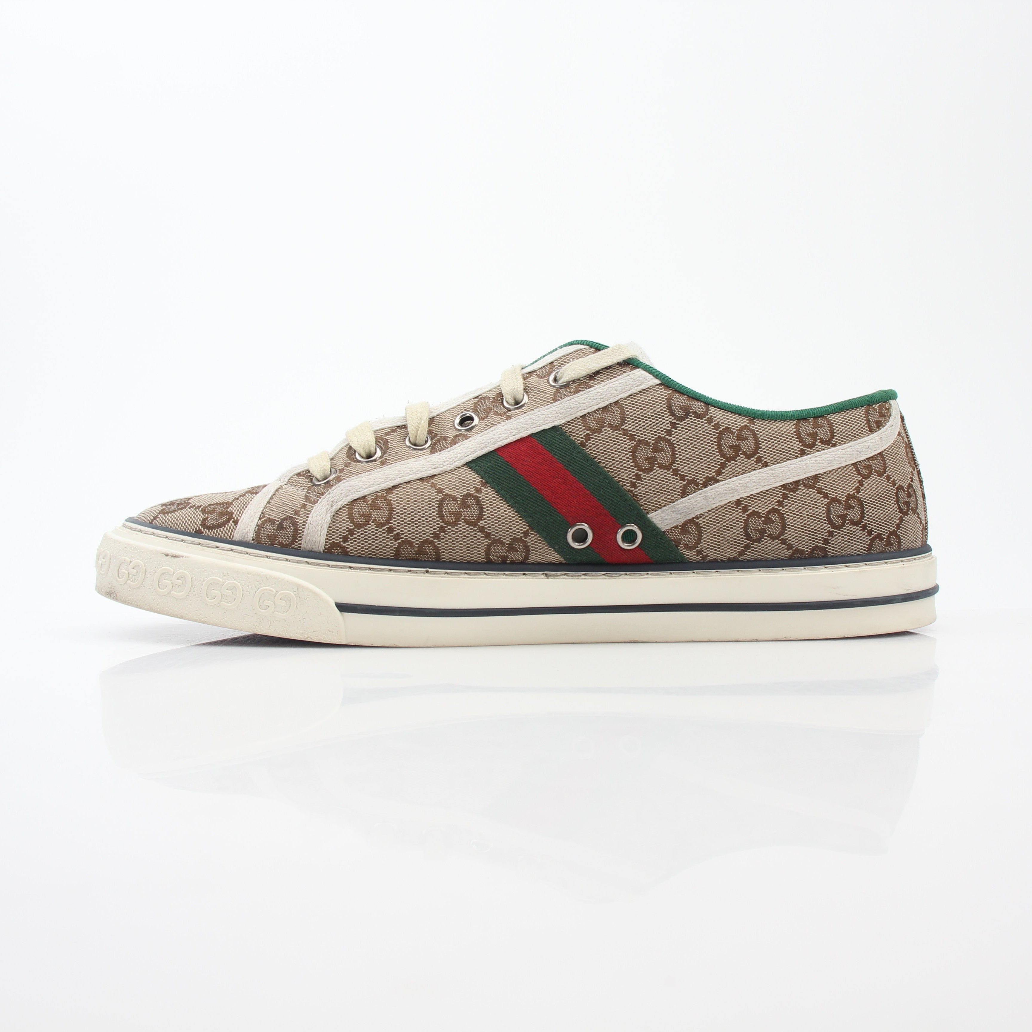 Gold & Beyond Gucci Beige GG Tennis 1977 sneakers showing beige canvas with brown and green accents and rubber sole.