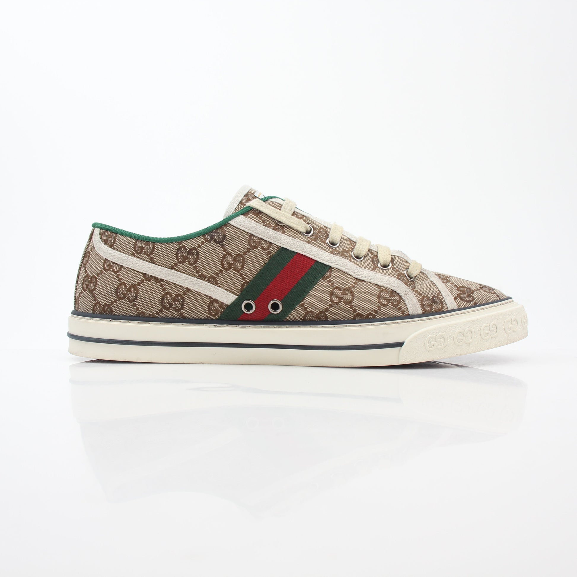 Gold & Beyond Gucci Beige GG Tennis 1977 sneakers, stylish shoes with signature logo and classic design, on a plain background.