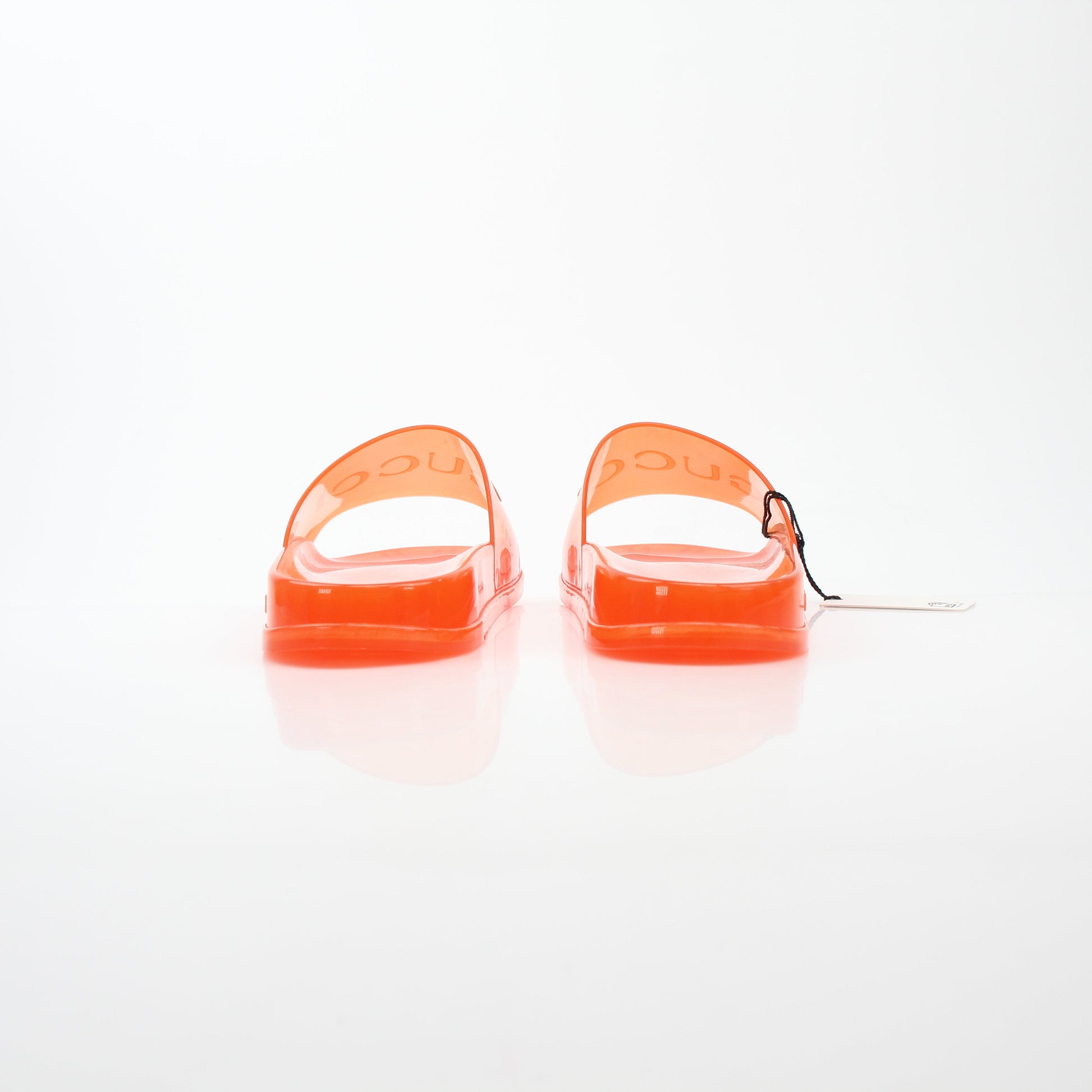 Gucci orange Pursuit logo slide sandals with a casual slip-on design, featuring branded straps and comfortable footbed.