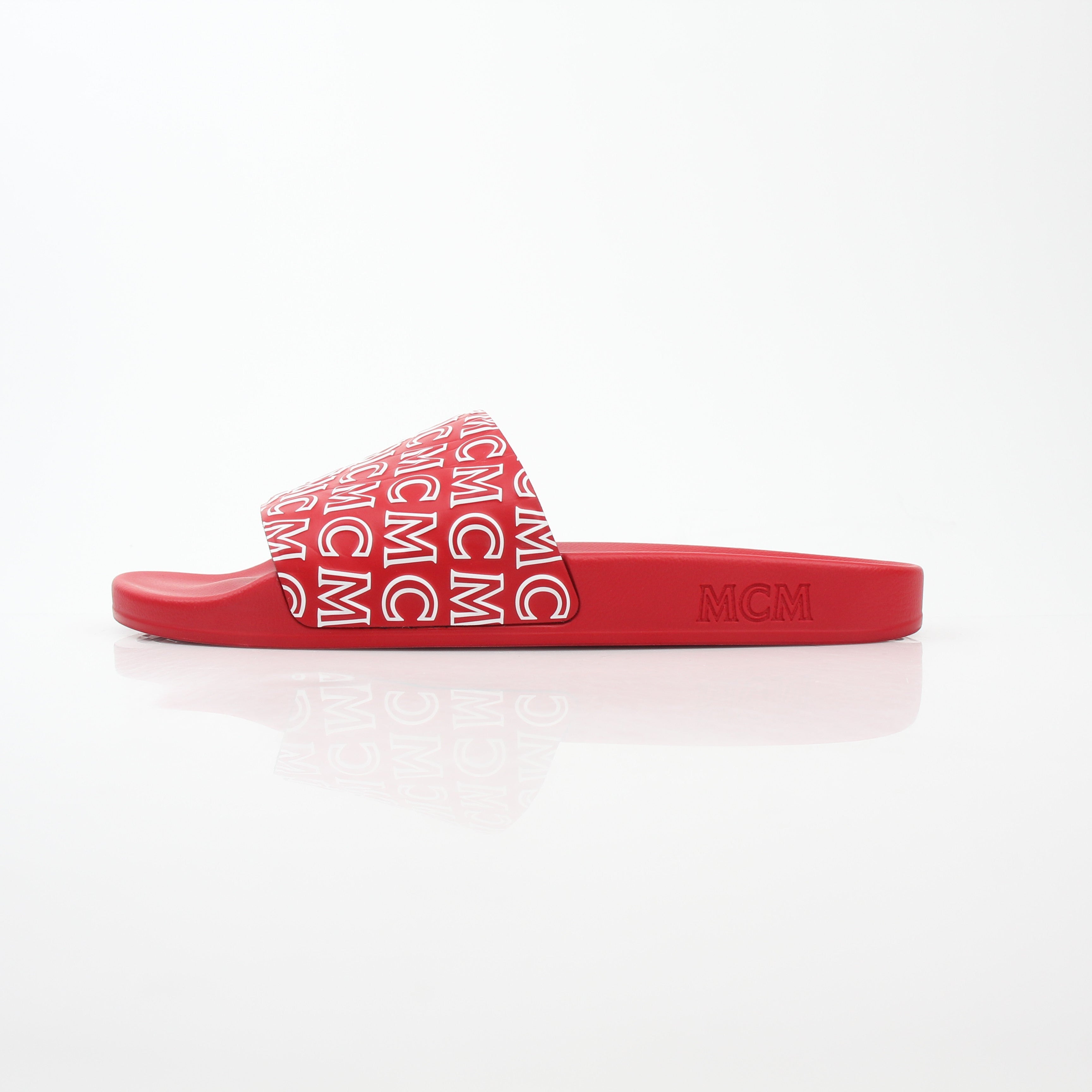 Red MCM logo print slide sandals by Gold & Beyond featuring open-toe design and comfortable slip-on style.