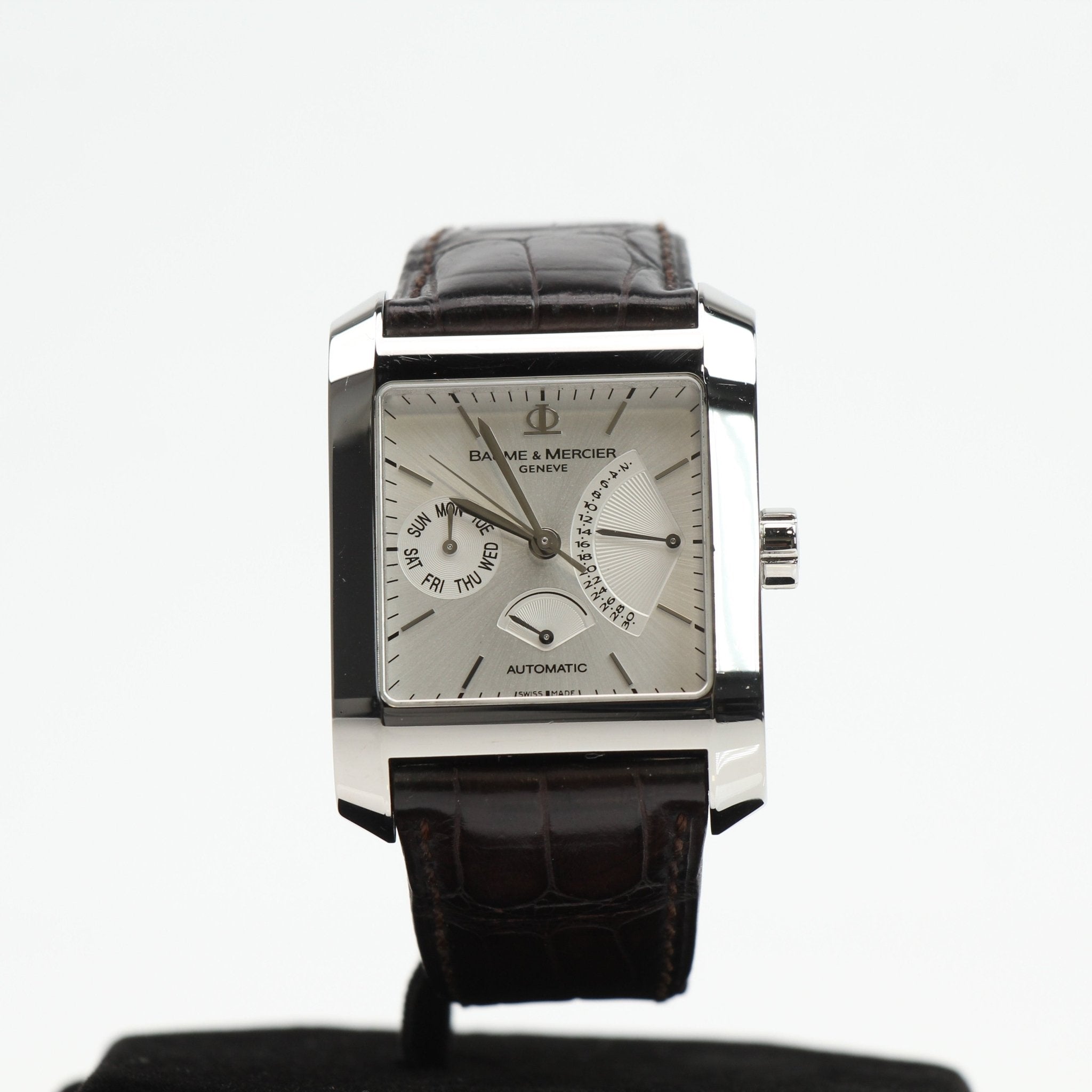 Gold & Beyond Baume & Mercier Hampton automatic watch with a sleek stainless steel case and elegant dial.