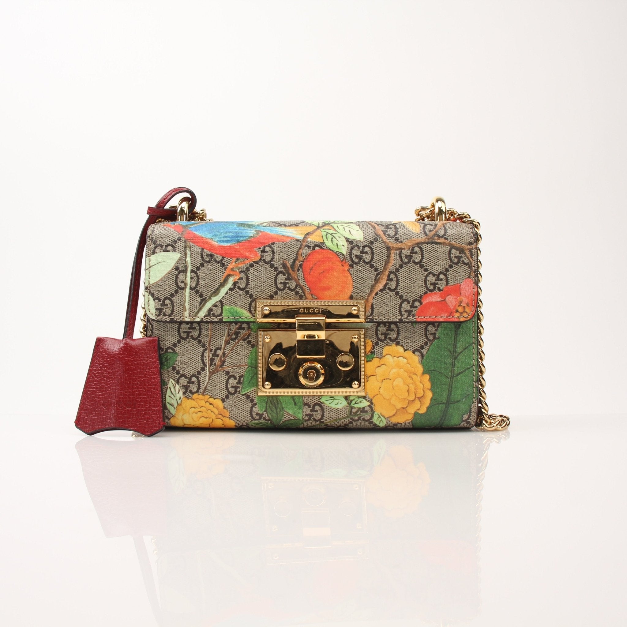 Gold & Beyond Gucci Tian Padlock Shoulder Bag handbag with gold hardware, featuring a padded design and signature lock detail.