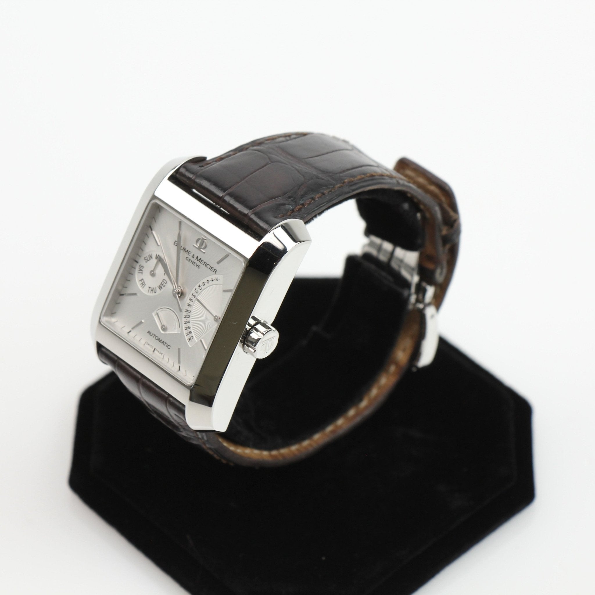 Gold & Beyond Baume & Mercier Hampton Automatic Watch with stainless steel case and black leather strap.