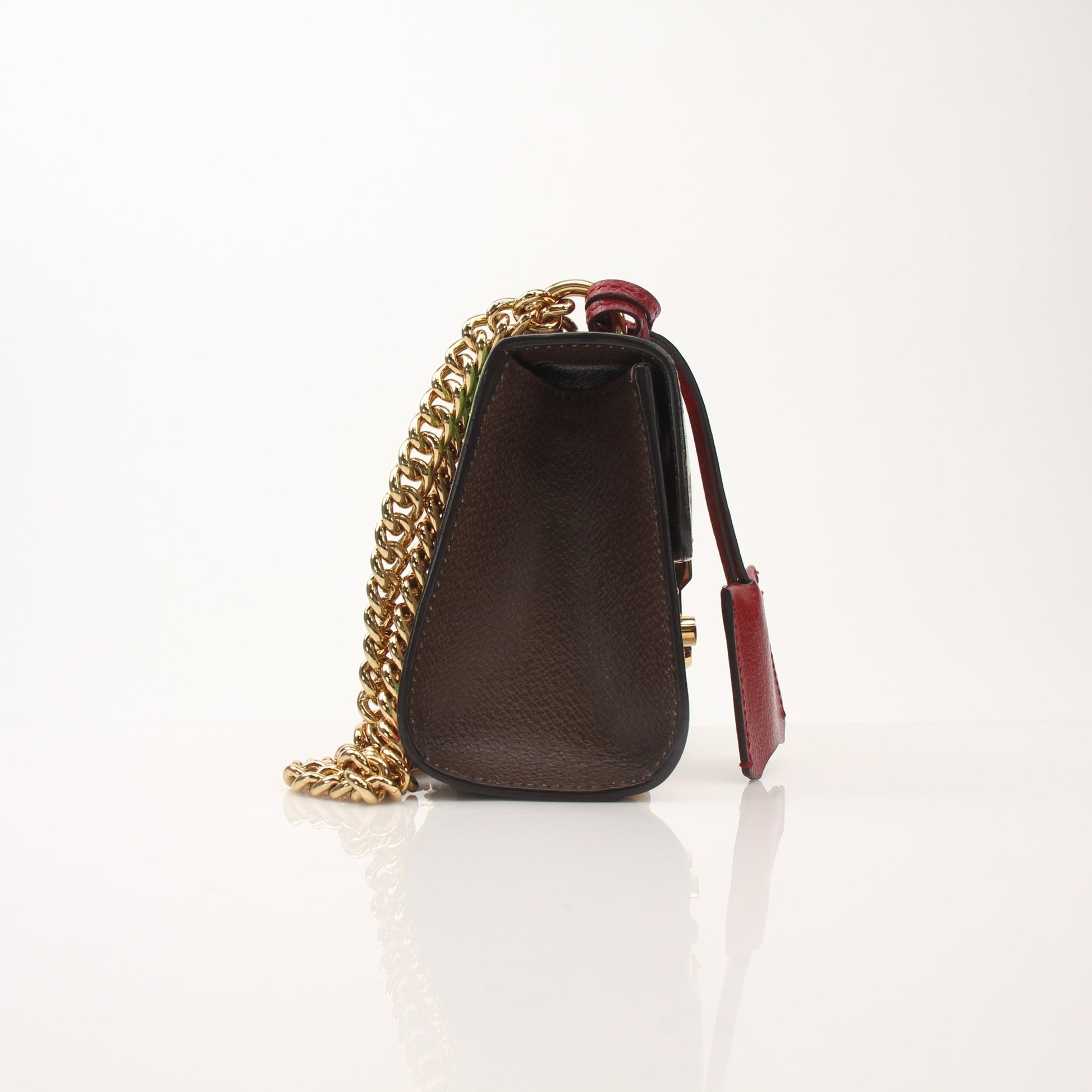 Gold & Beyond Gucci Tian Padlock Shoulder Bag handbag with gold hardware and quilted leather design.